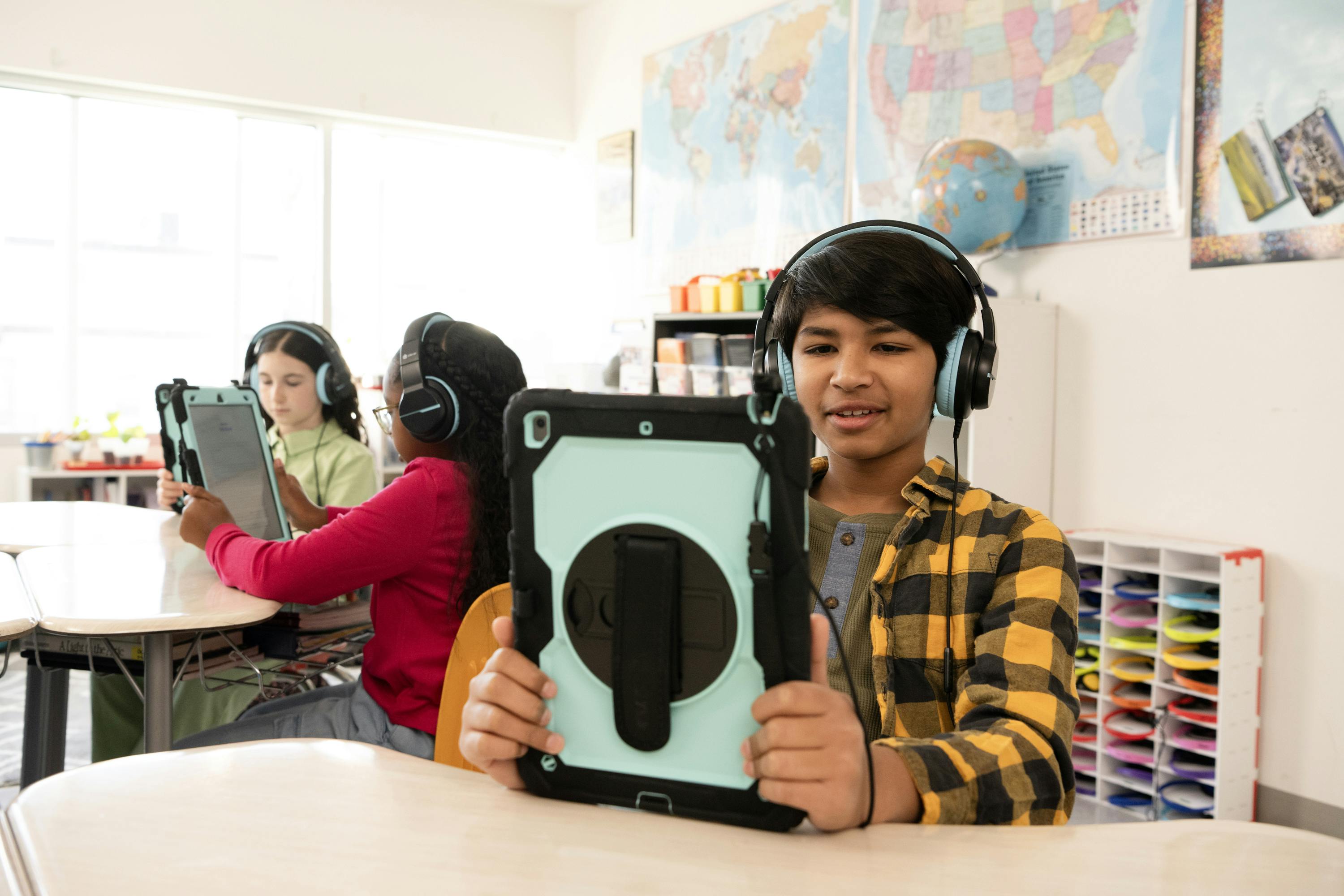 A classroom of students reads at their desks