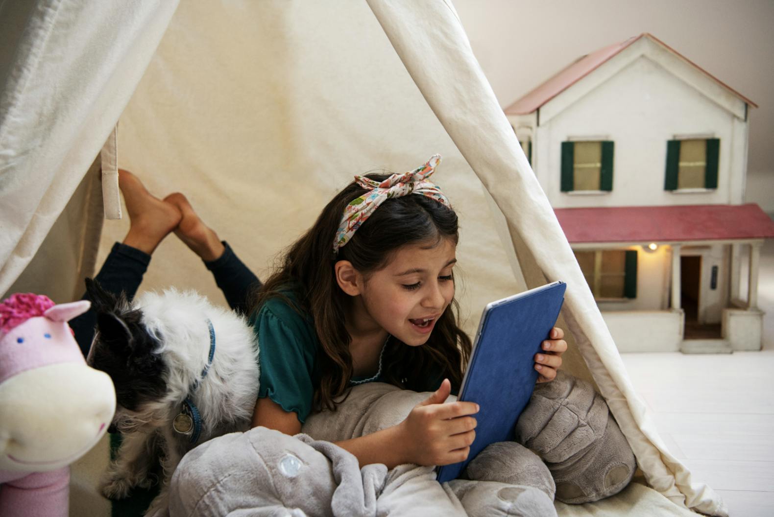 A reader reads by herself at home