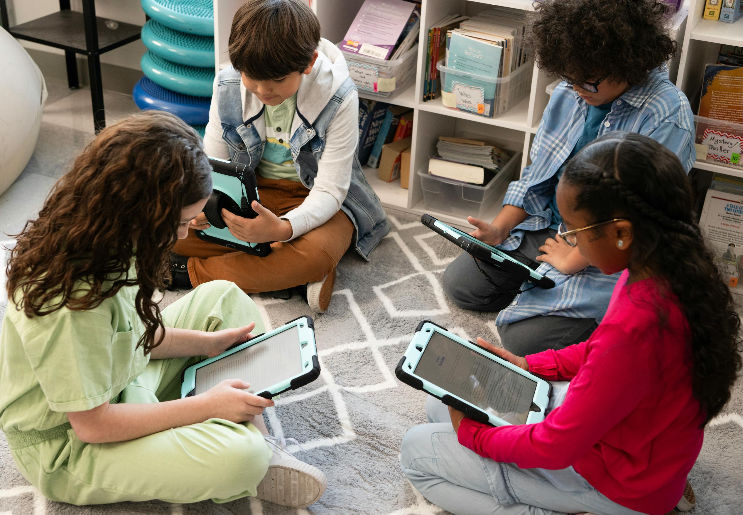 Children read together in a group