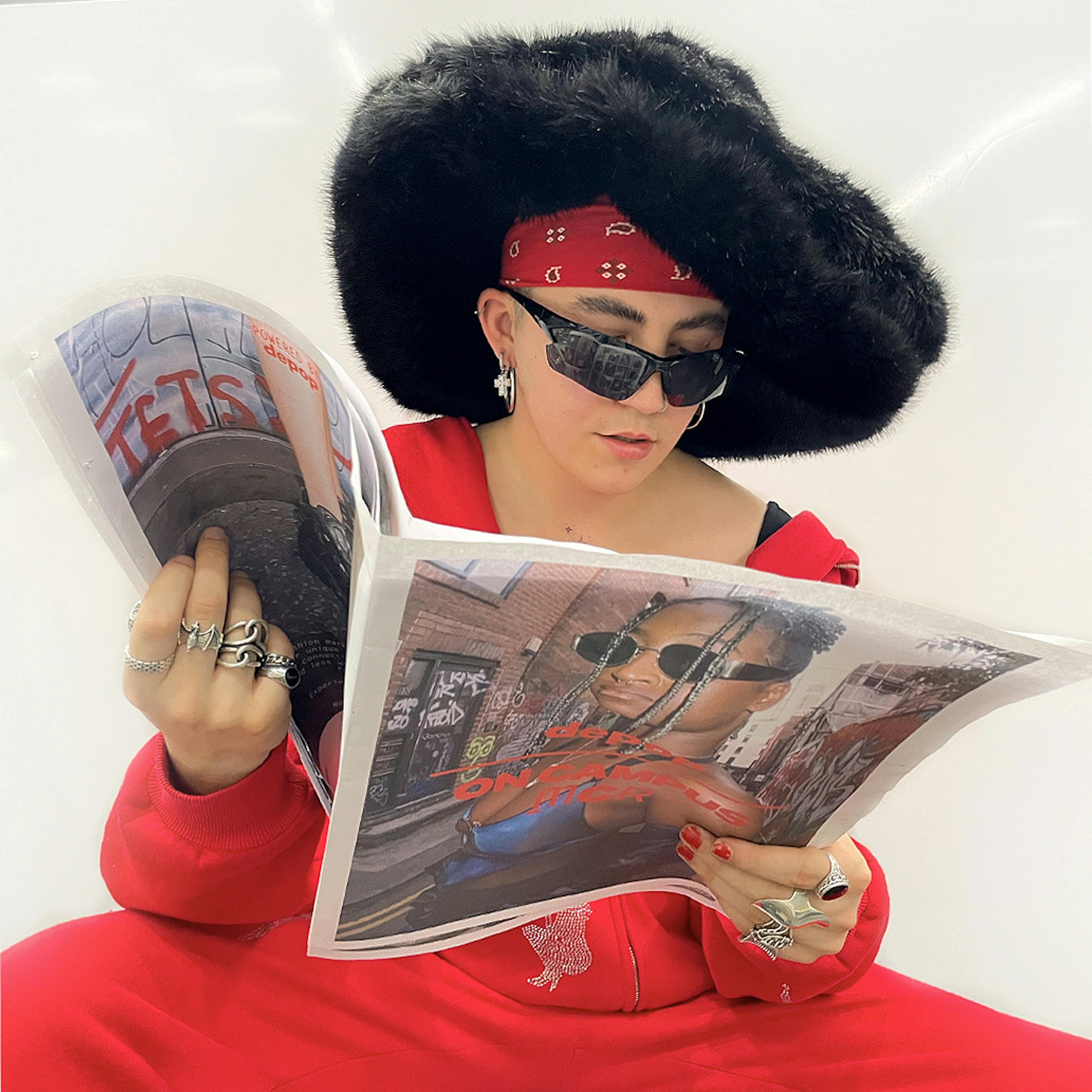 woman reading depop newspaper