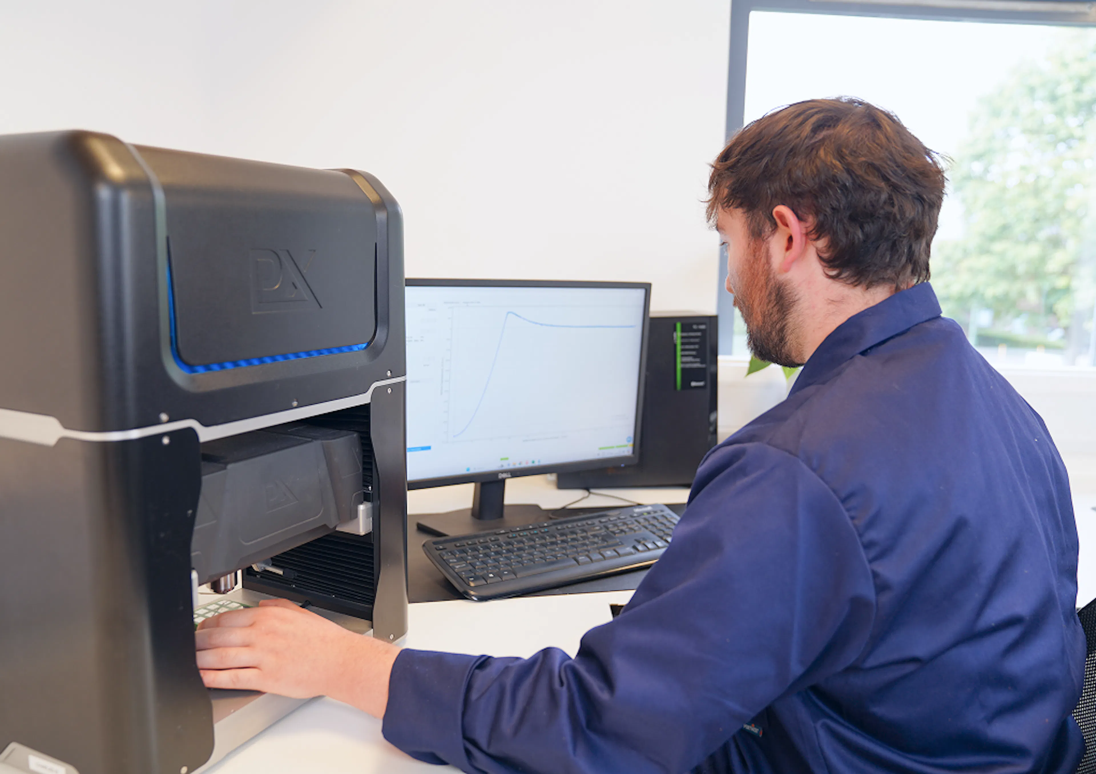 Plastometrex employee using the startup's product
