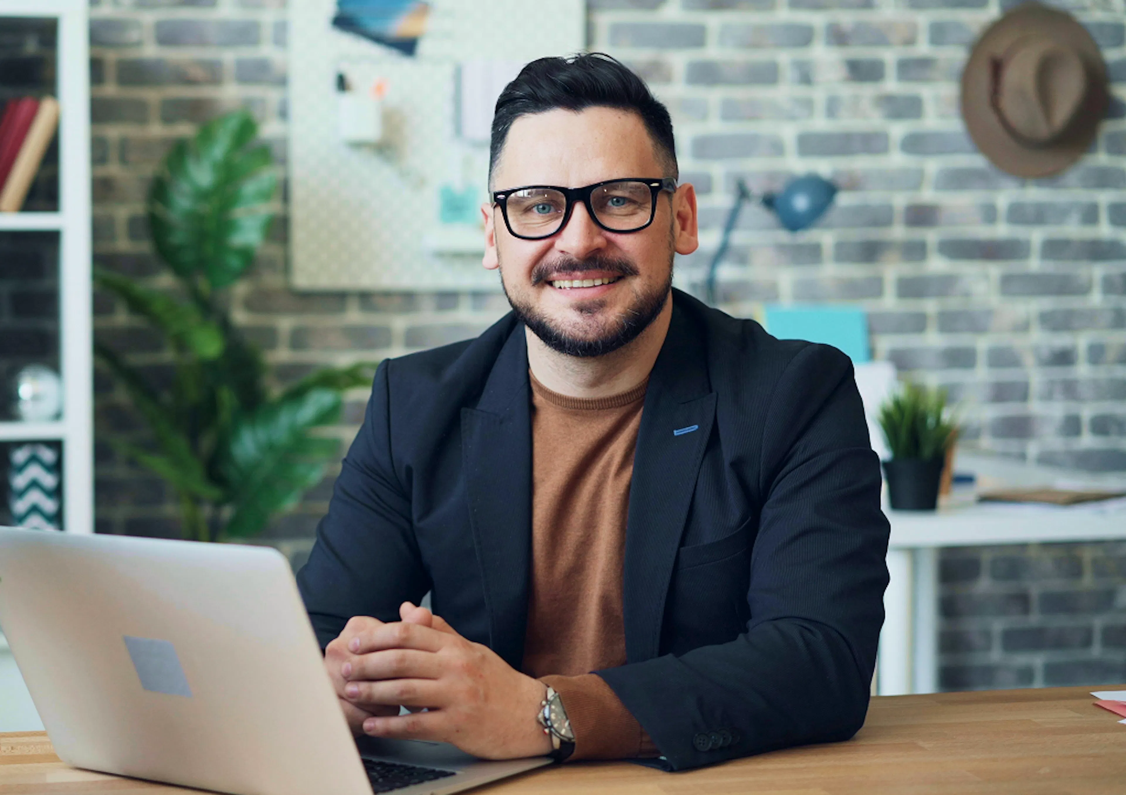 Businessman looks to camera