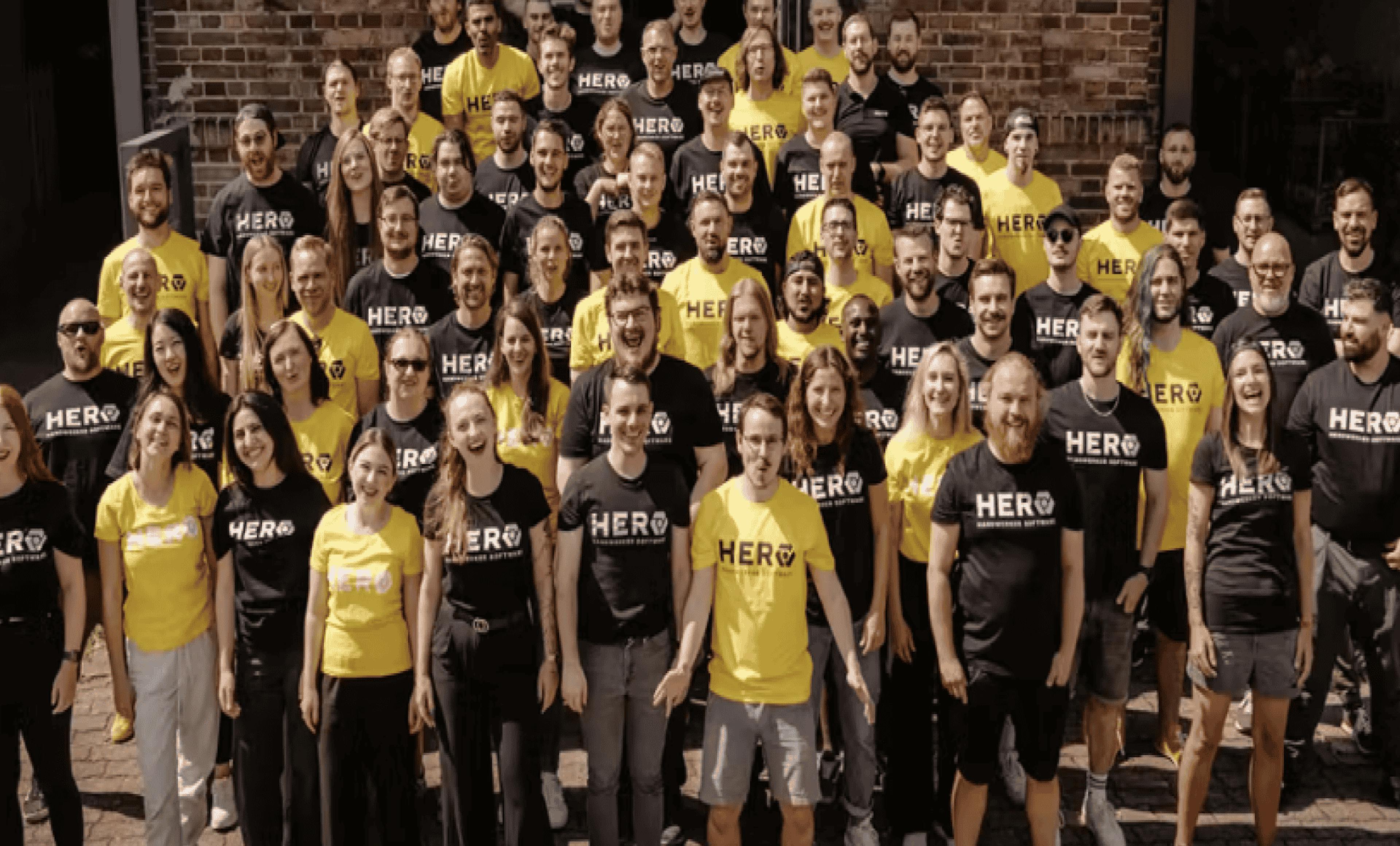 hero workers taking group photo outside
