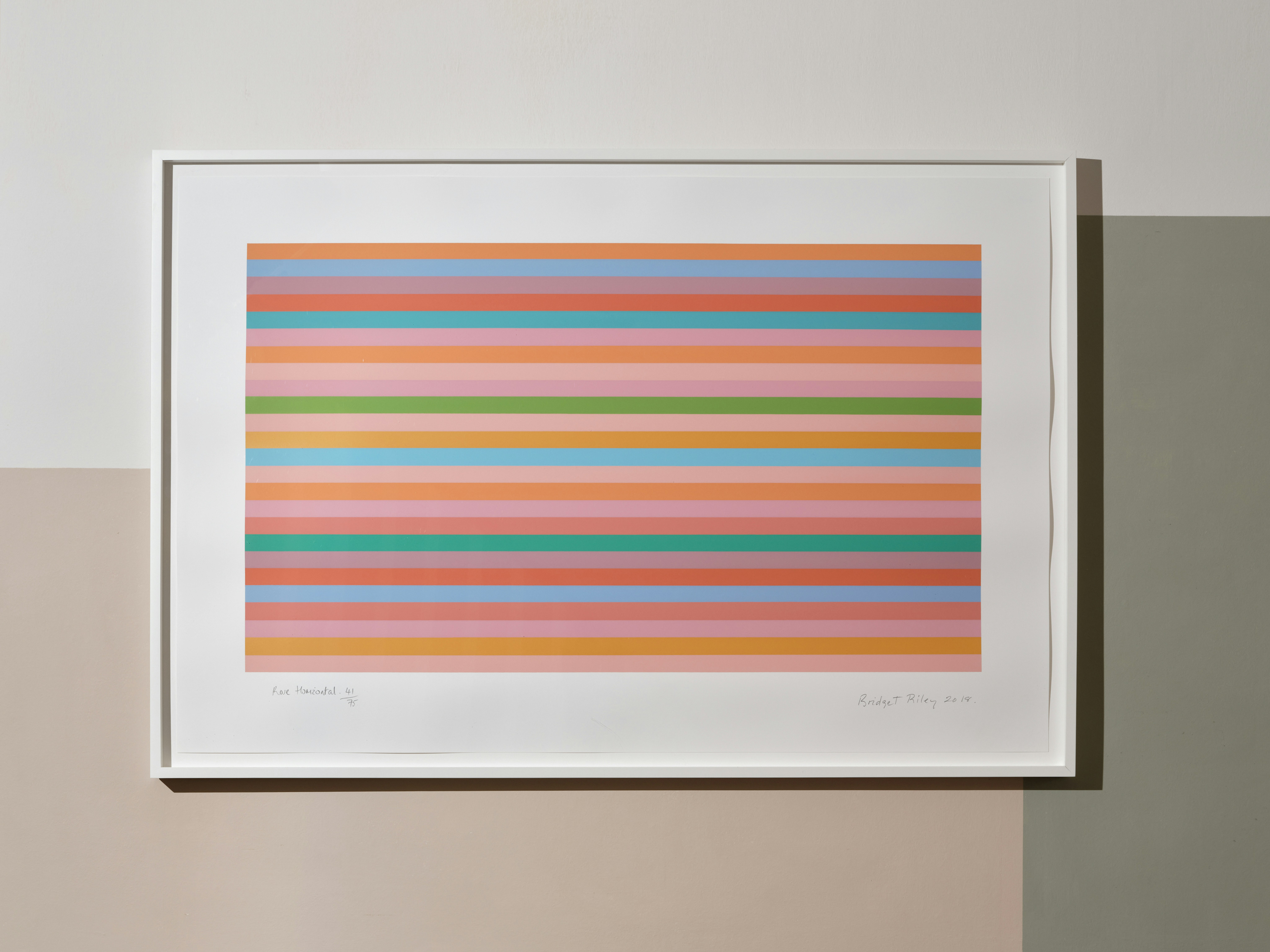 installation photograph of screenprint by Bridget Riley depicting colourful horizontal lines