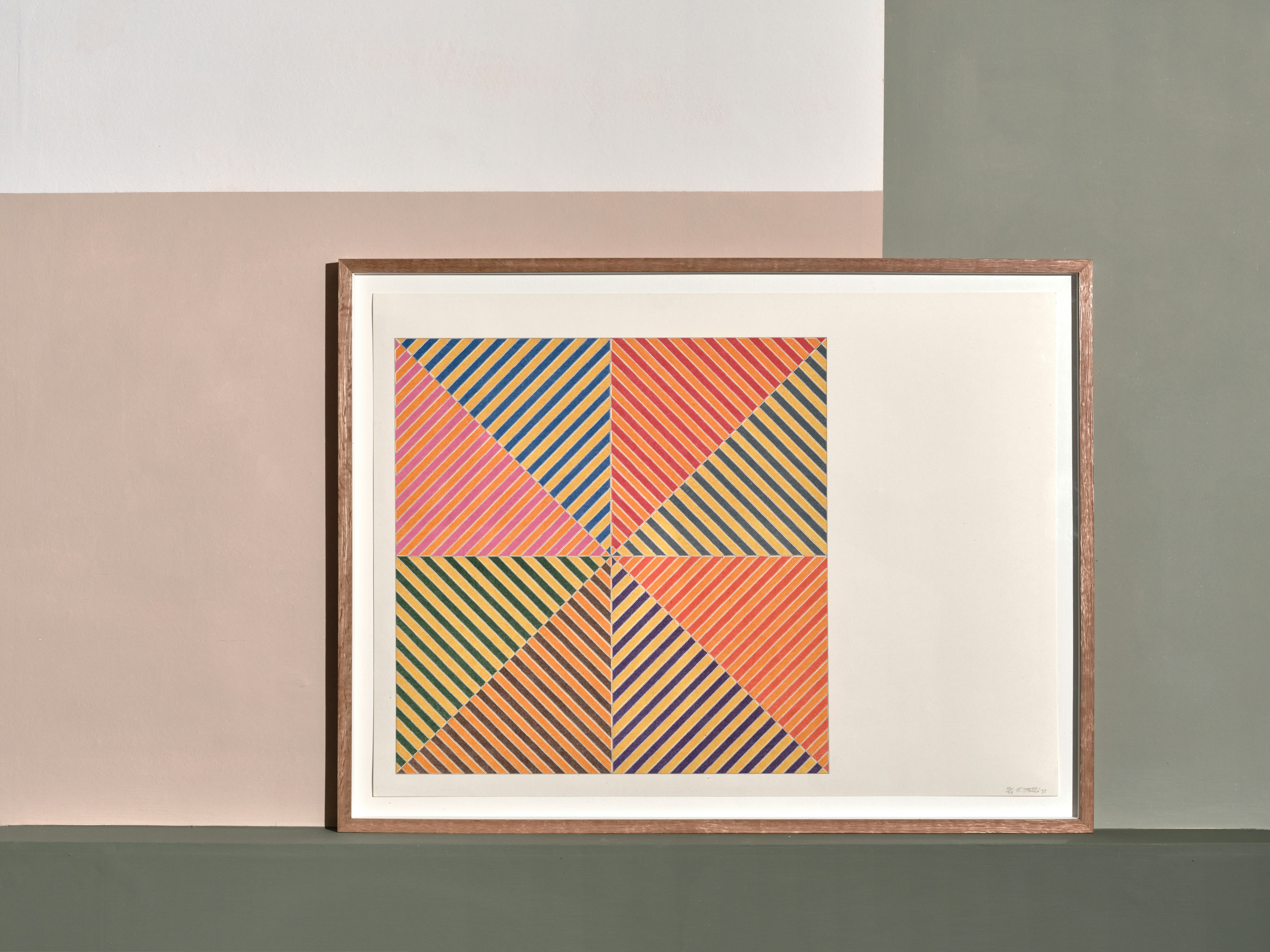 installation photograph of framed offset lithograph in colours by Frank Stella depicting colourful lines forming square