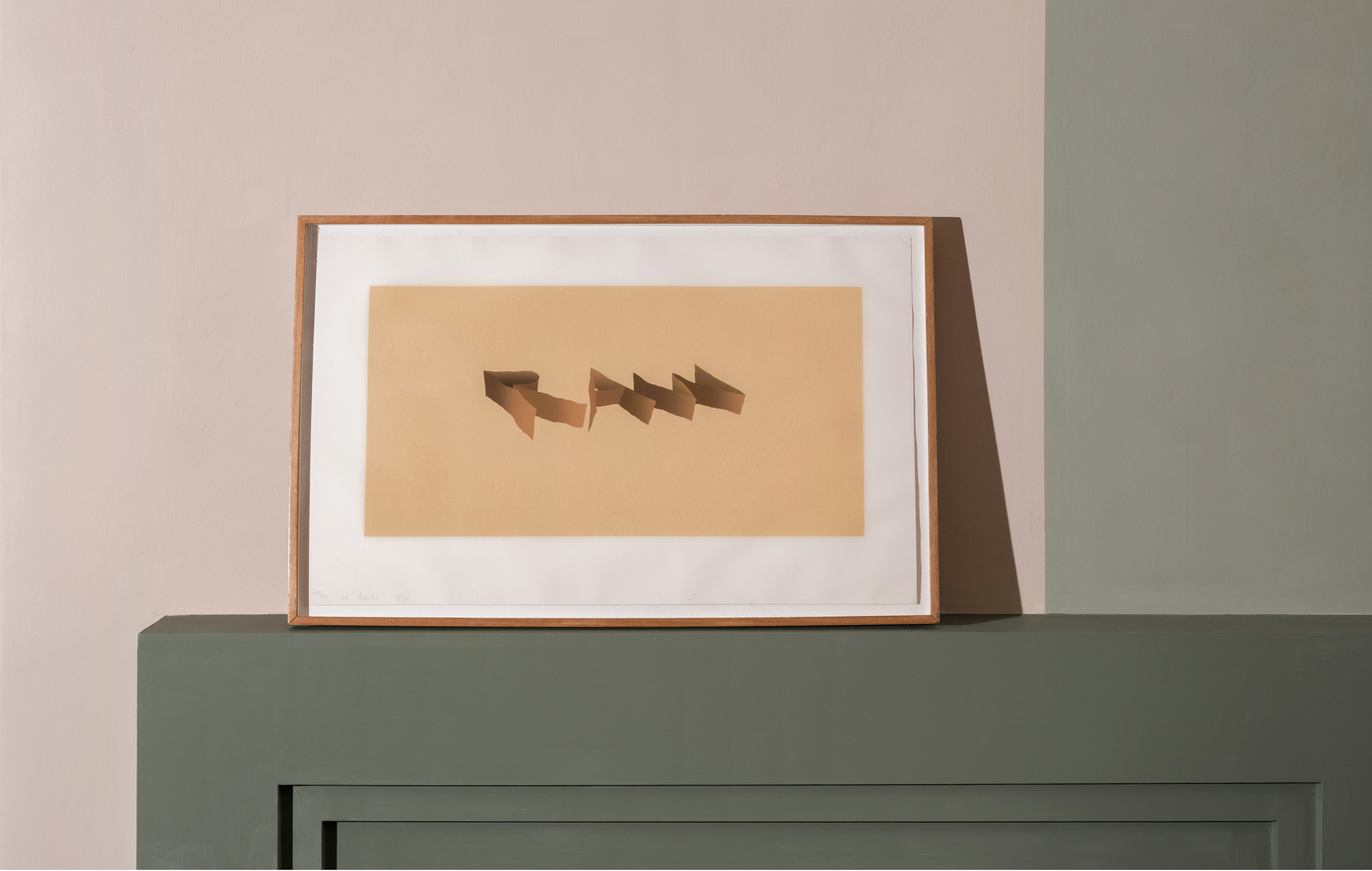 installation photograph of framed screenprint by Ed Ruscha in mustard yellow overlaid with the word raw in capital letters in perspective and slightly skewed in darker tone brown-yellow