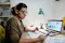 female on computer