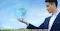 Image of man holding Earth