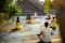 Visitors practice yoga at Potato Head Beach Club