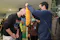 Sandiaga Uno, Minister of Tourism and Creative Economy, welcomes a tourist to I Gusti Ngurah Rai International Airport, Bali.