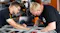 Robotic engineers at Small Robot Company working on agricultural data gathering hardware.