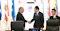 speakers shaking hands