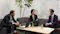 2 men and a women discussing