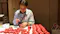 craftsman creating Akabeko