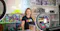 Shop keeper behind counter in toy store