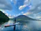 Male on canoe taking a photo