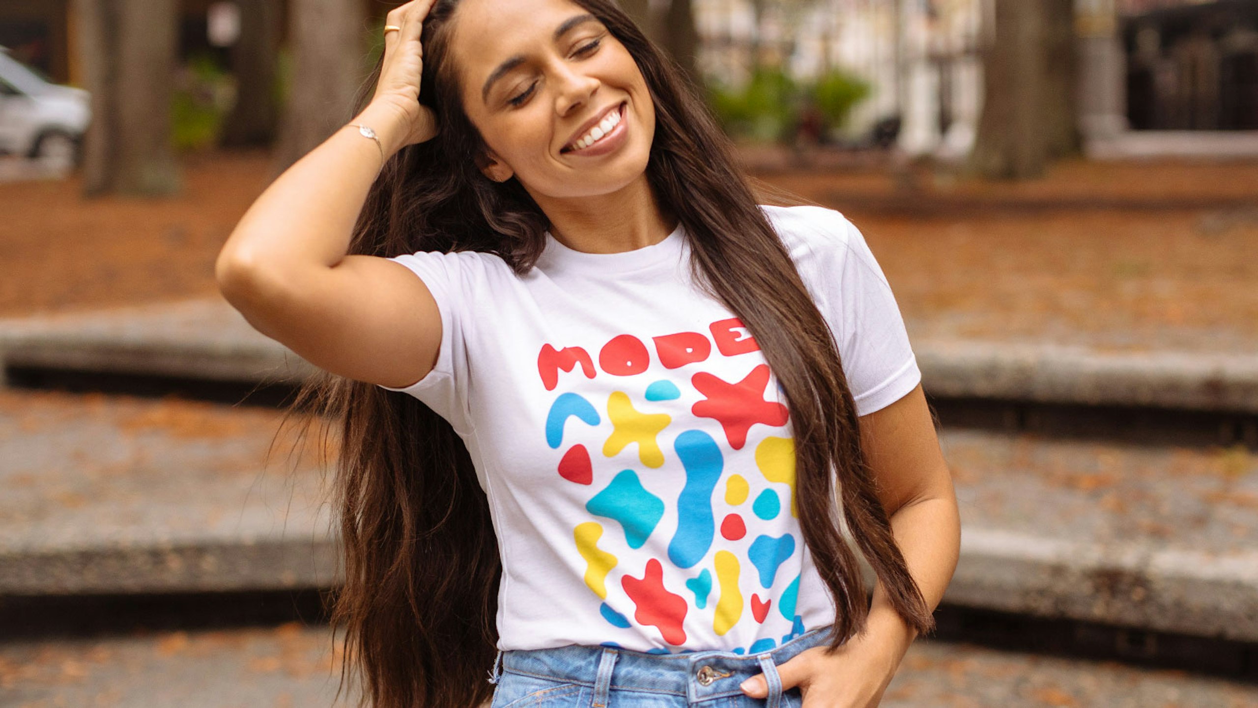 women wearing a white shirt with a geometric-like design