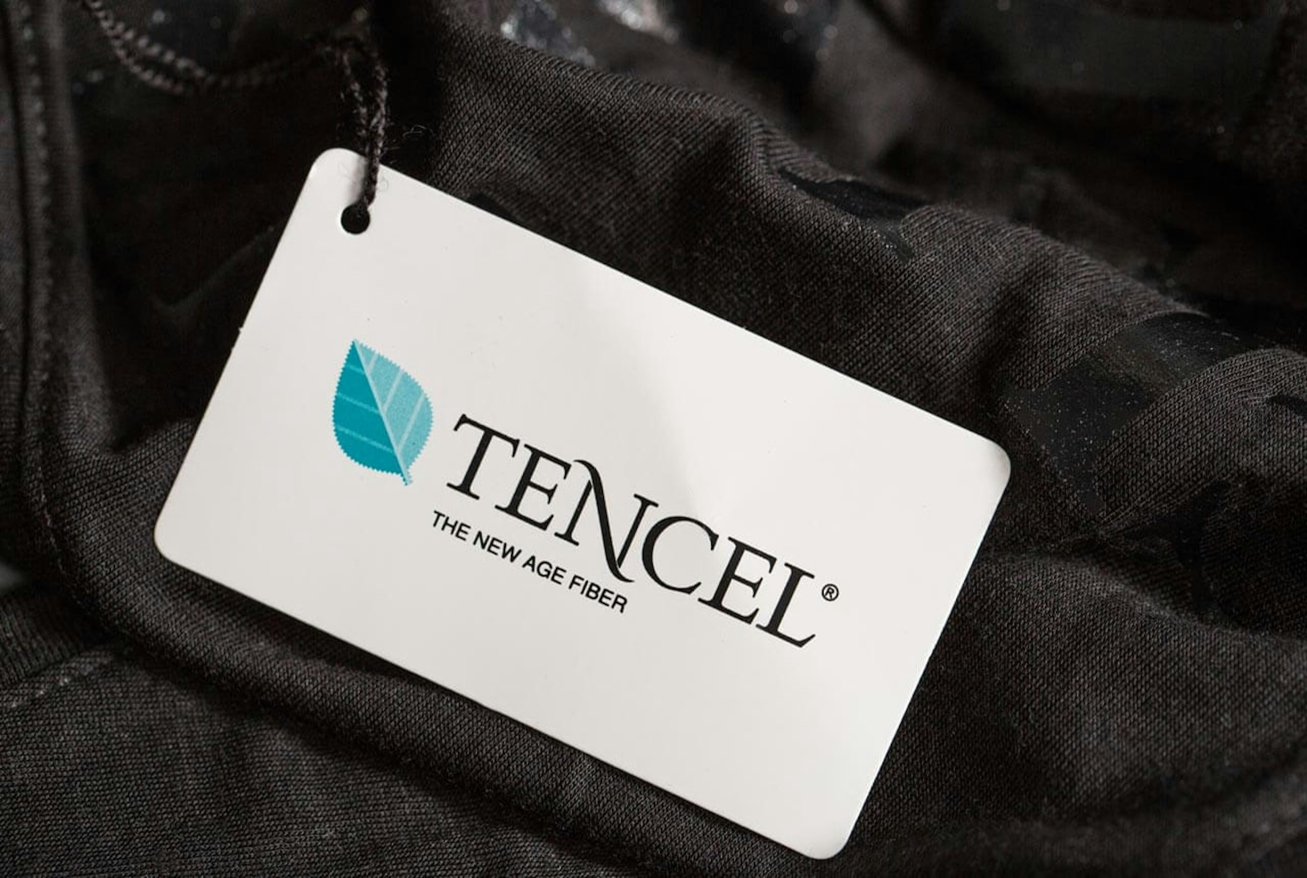 A hang tag the tells the fabric style 