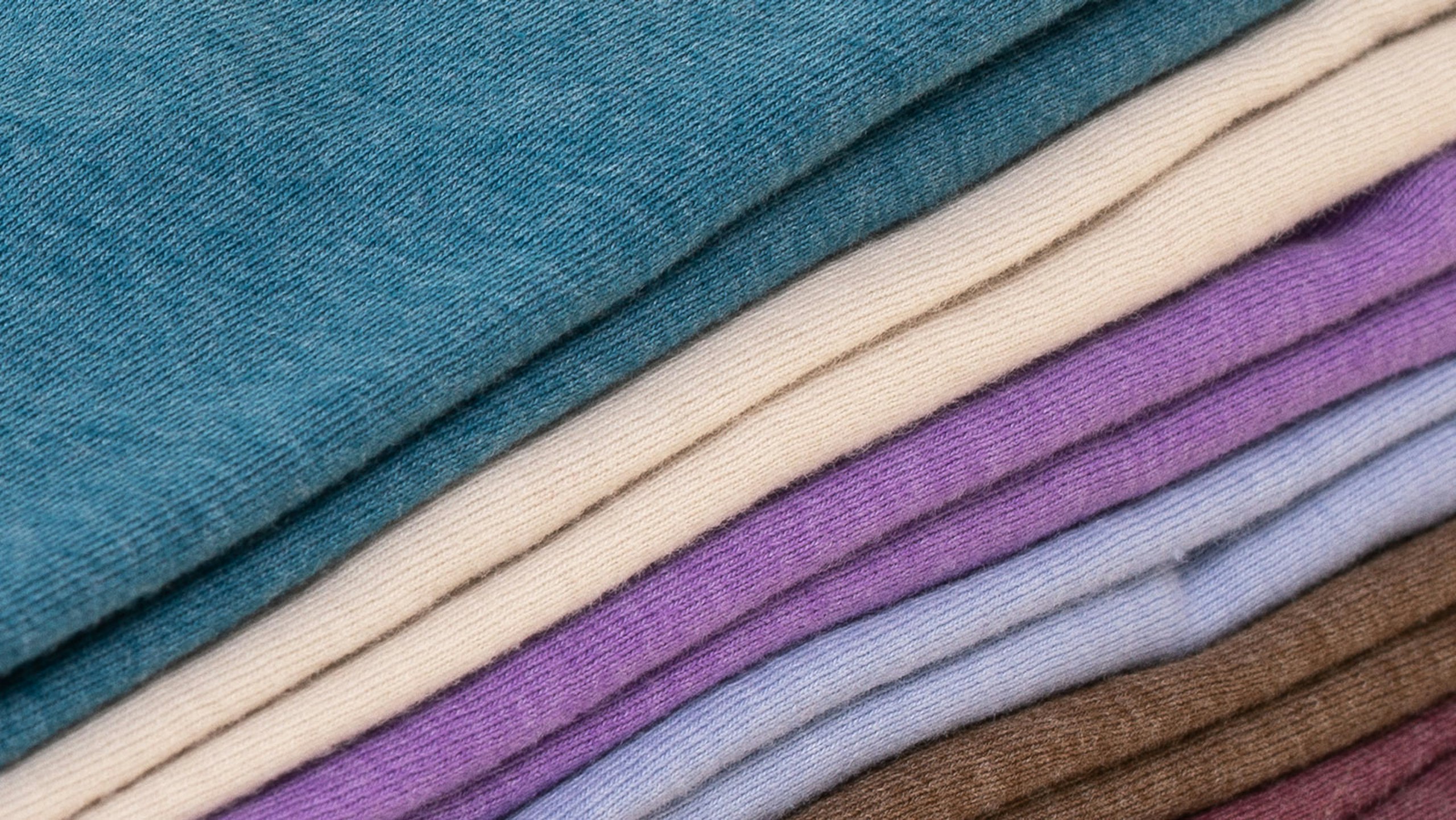 close up stack of t-shirts