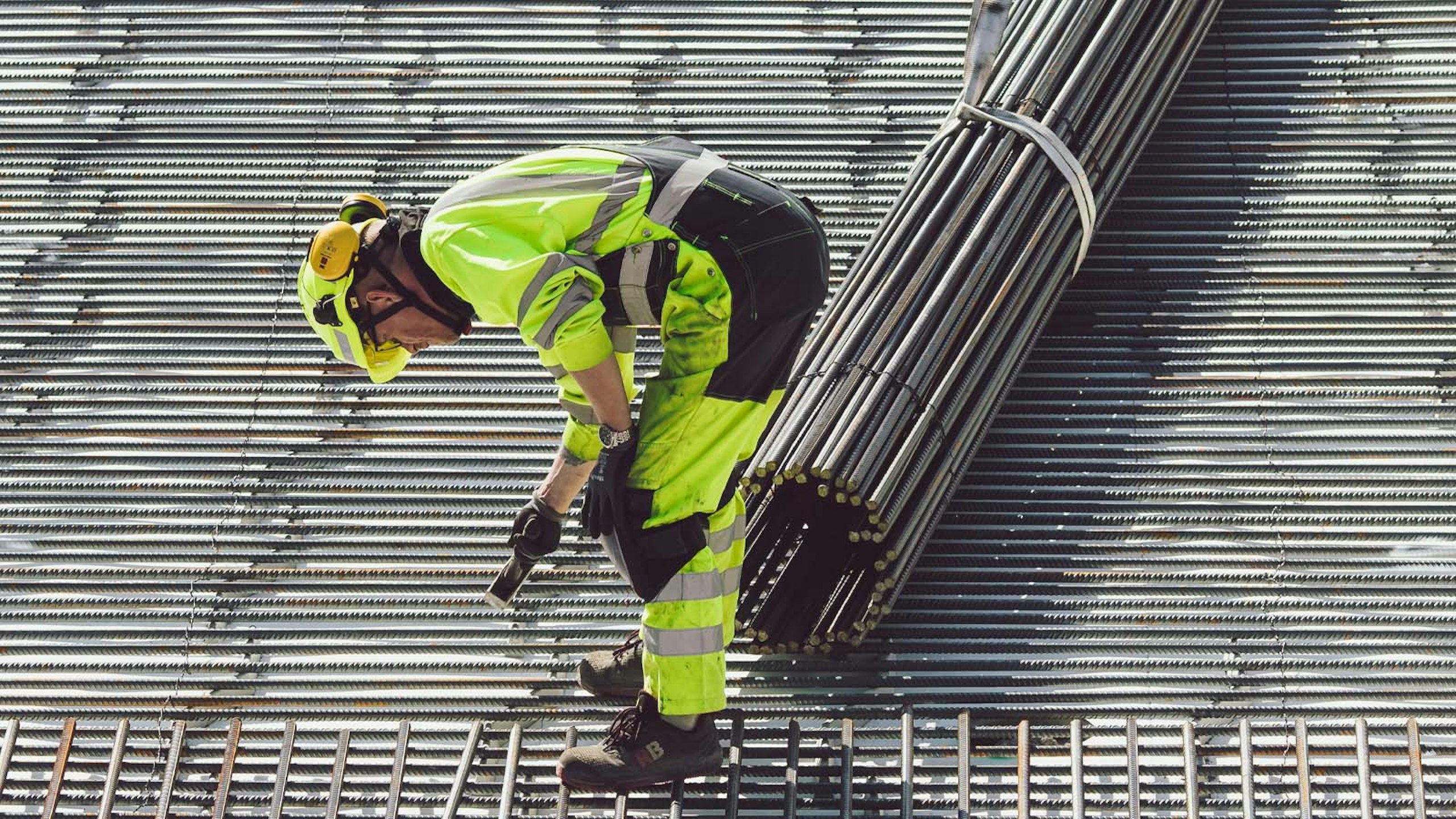 construction worker laying rebar