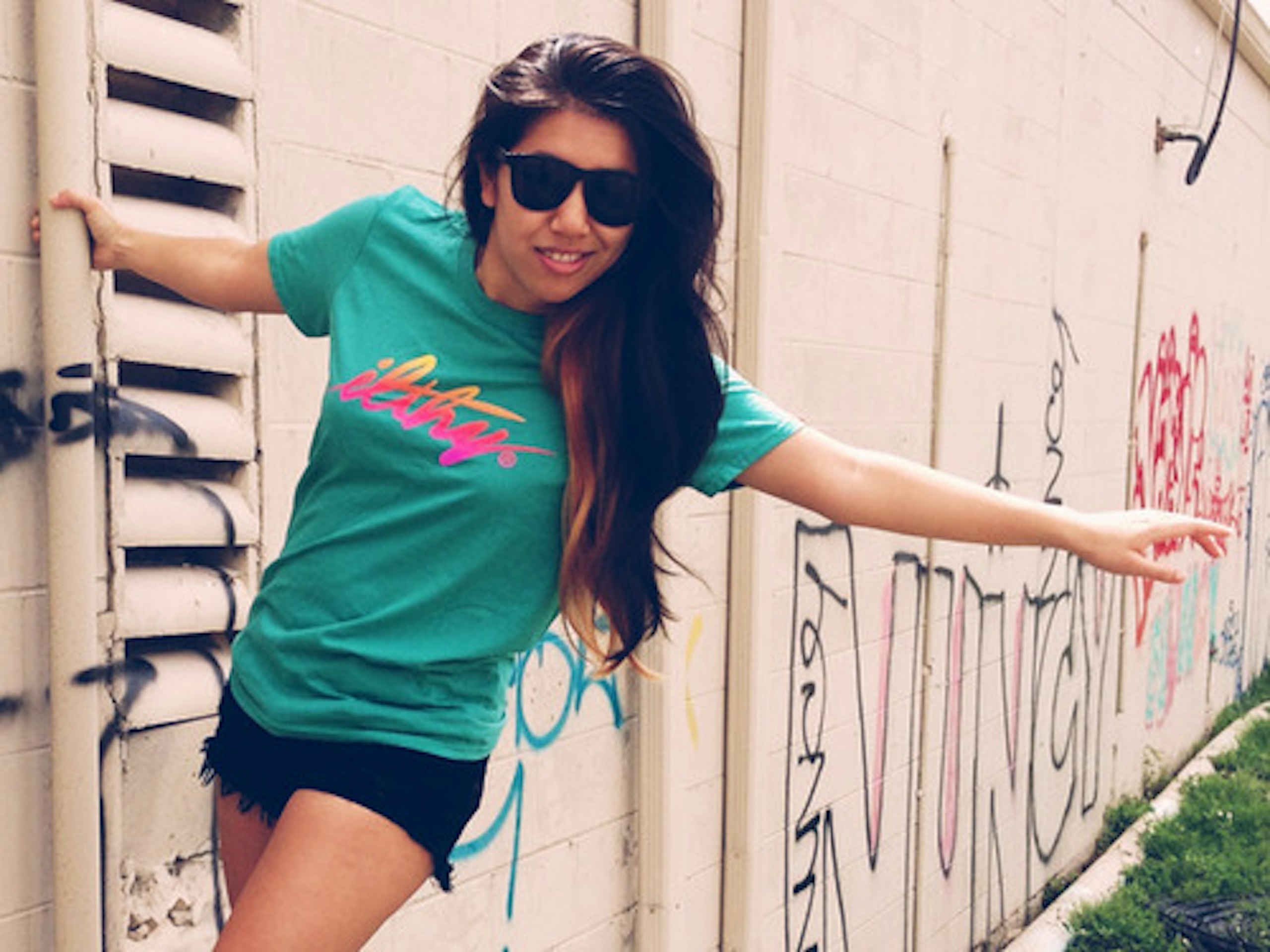girl with iLTHY green t-shirt