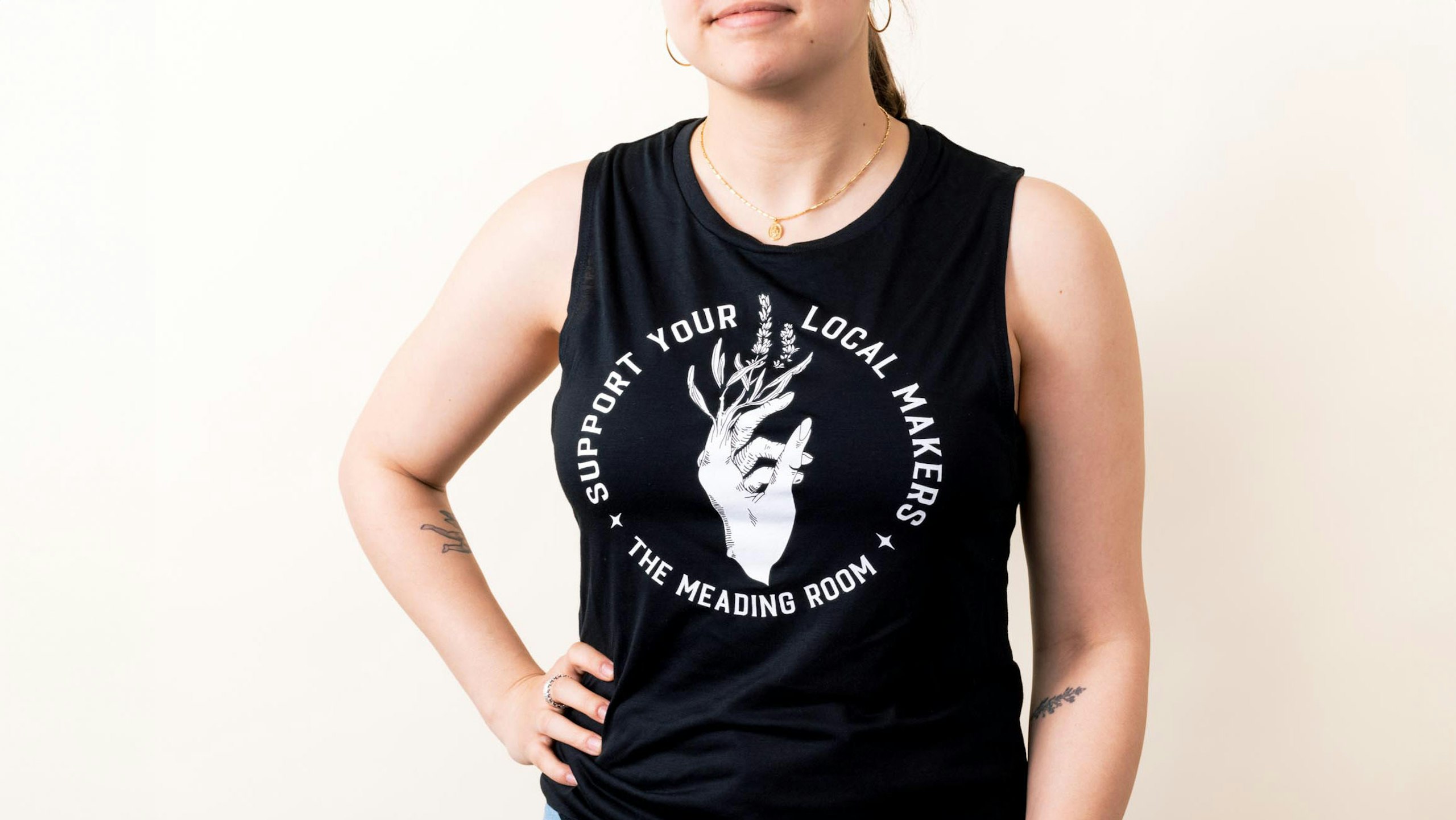 woman wearing a black tank top