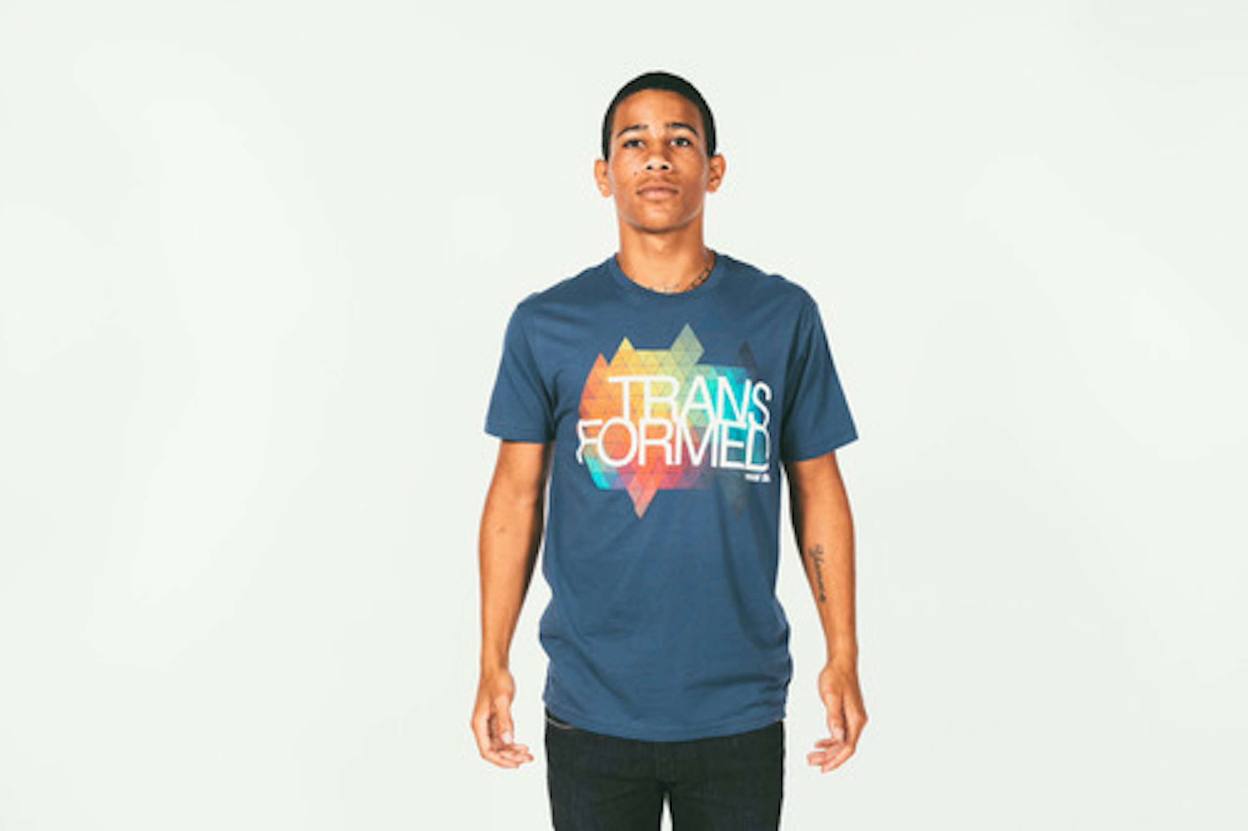 person with a navy shirt on and sim-process imprint