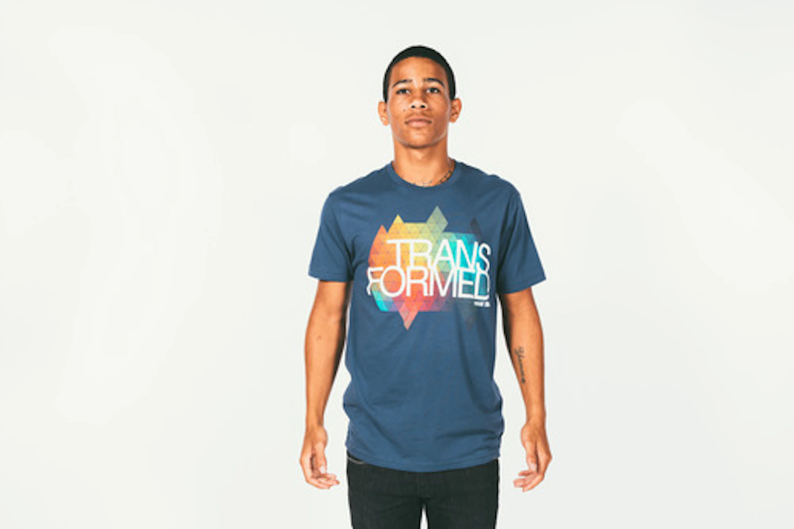 person with a navy shirt on and sim-process imprint
