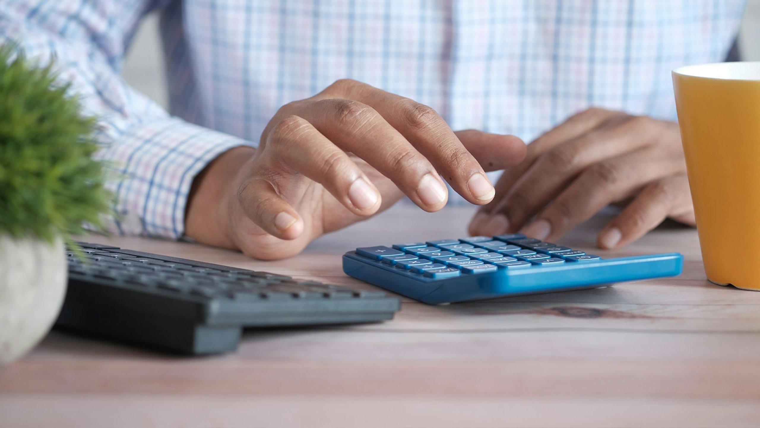person using a calculator