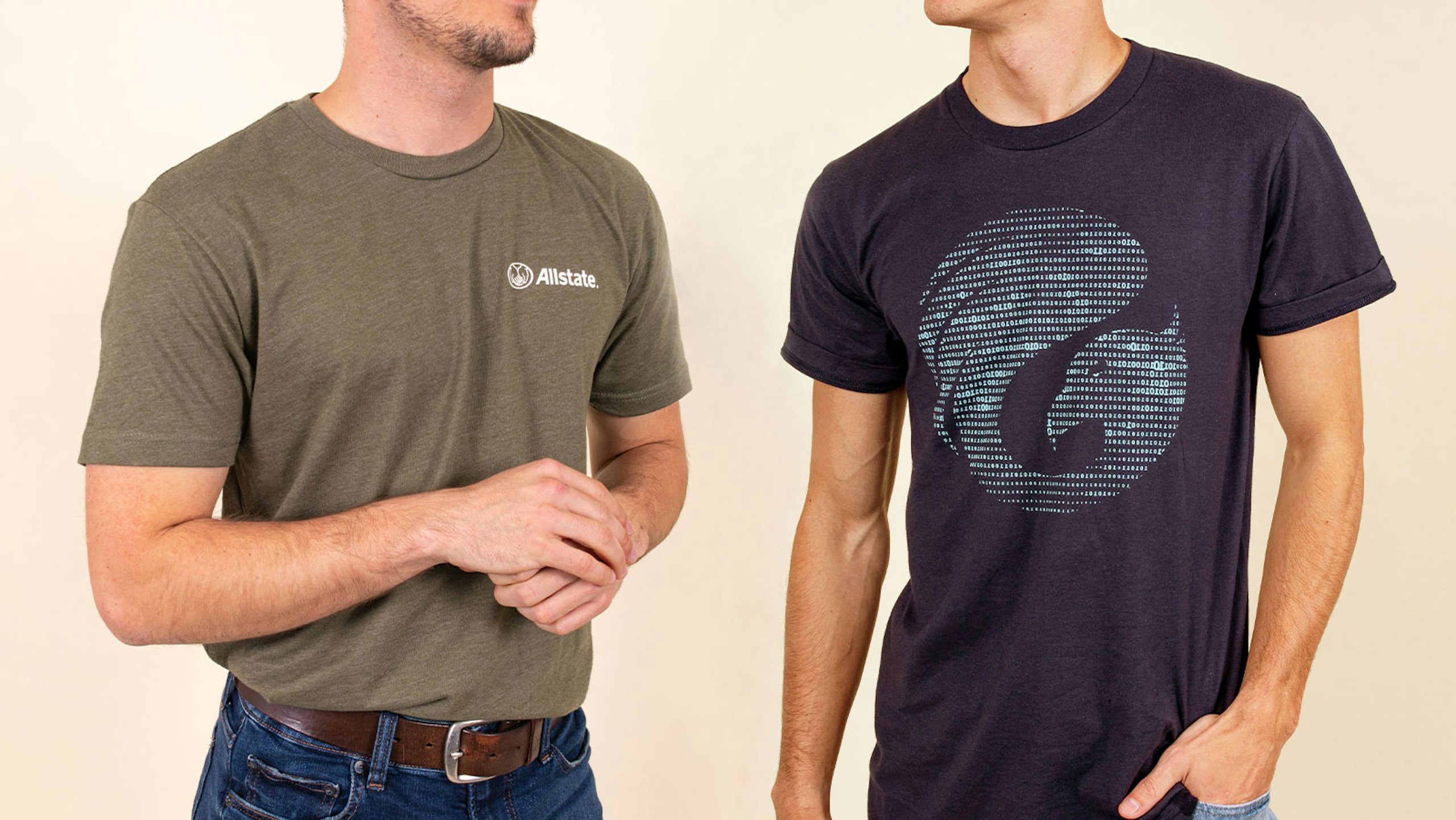 two people wearing t-shirts, one olive green and one navy