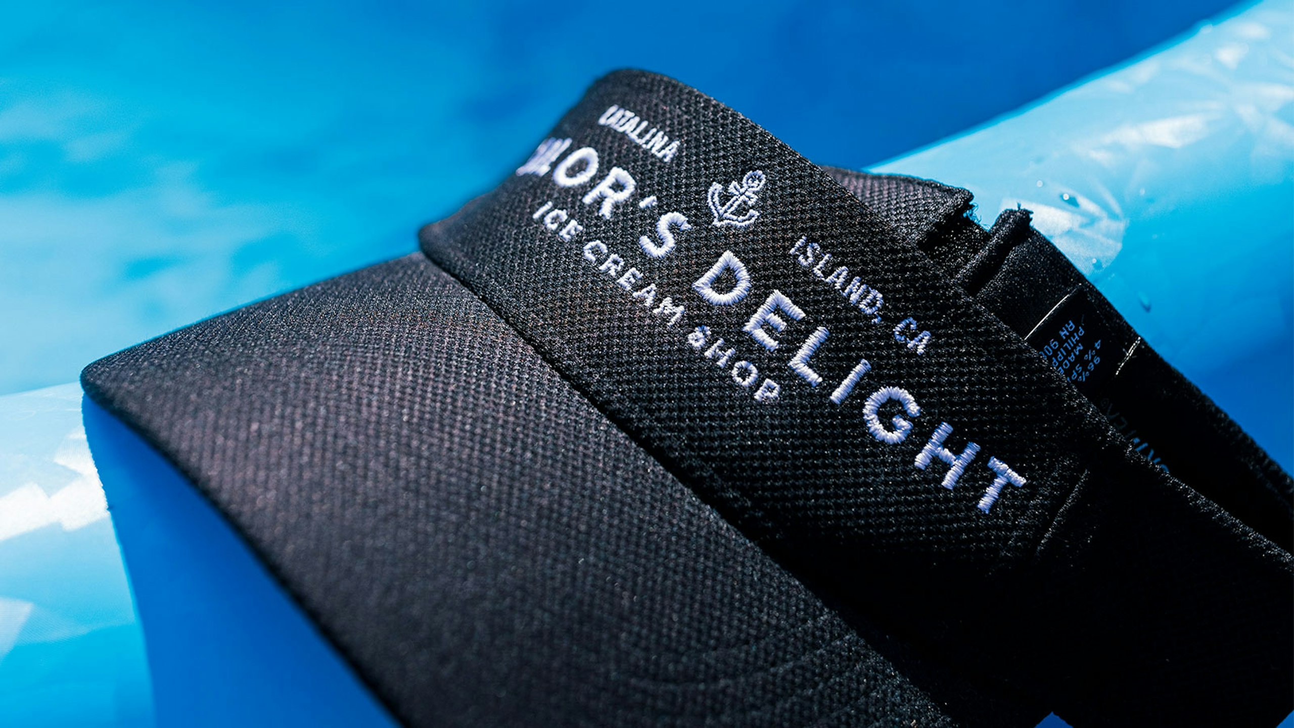 black visor white embroidered lettering