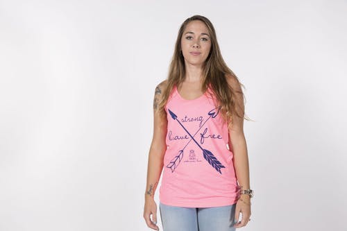 women wearing a pink tank top in a photoshoot women wearing a pink tank top in a photoshoot