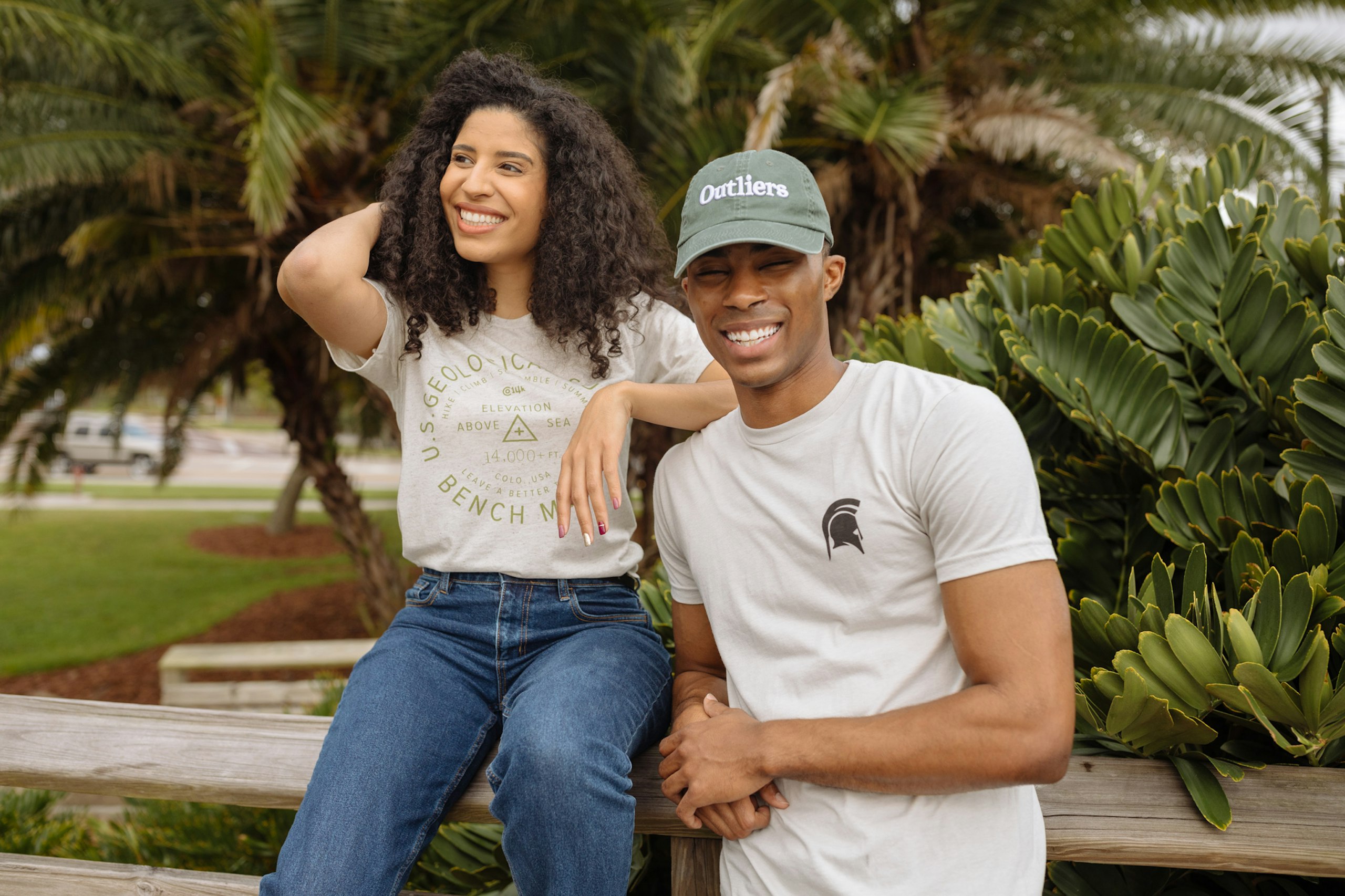 two people wearing off white t-shirts