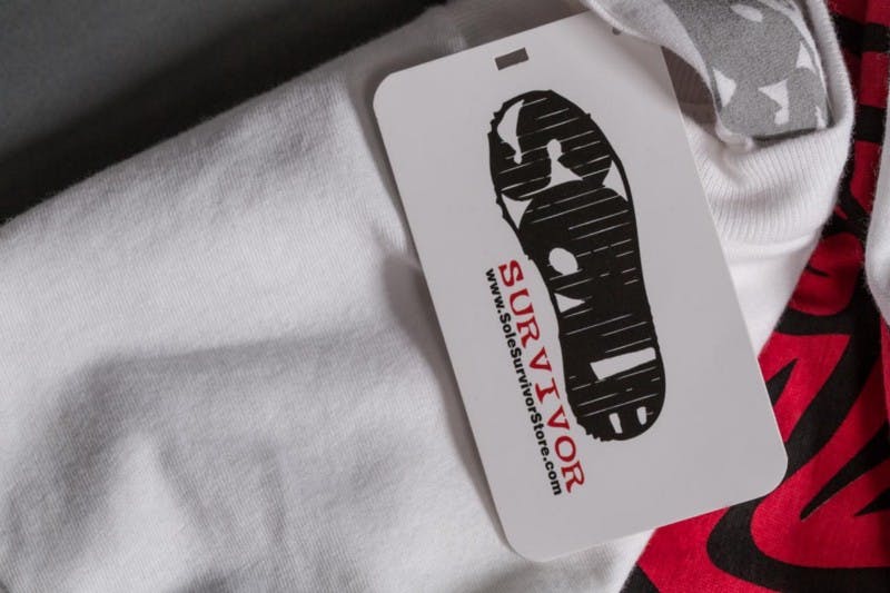 white hang tag on white shirt white hang tag on white shirt