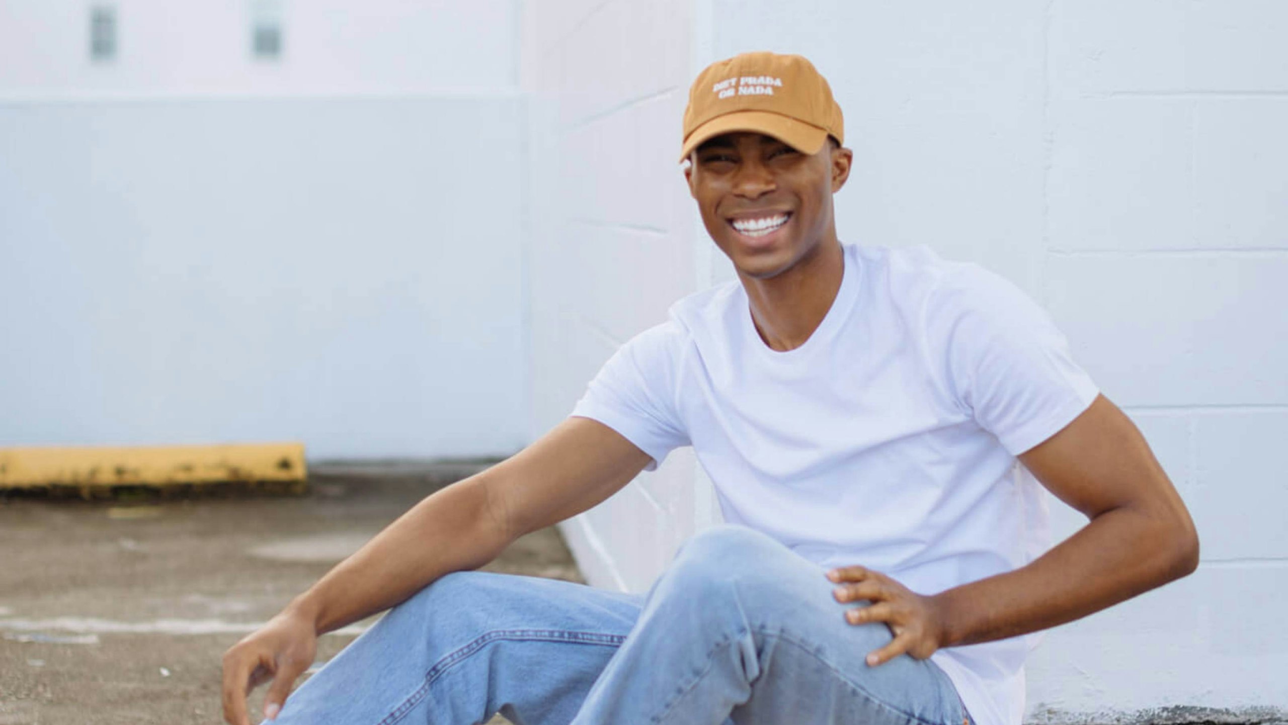 man wearing a brown dad hat