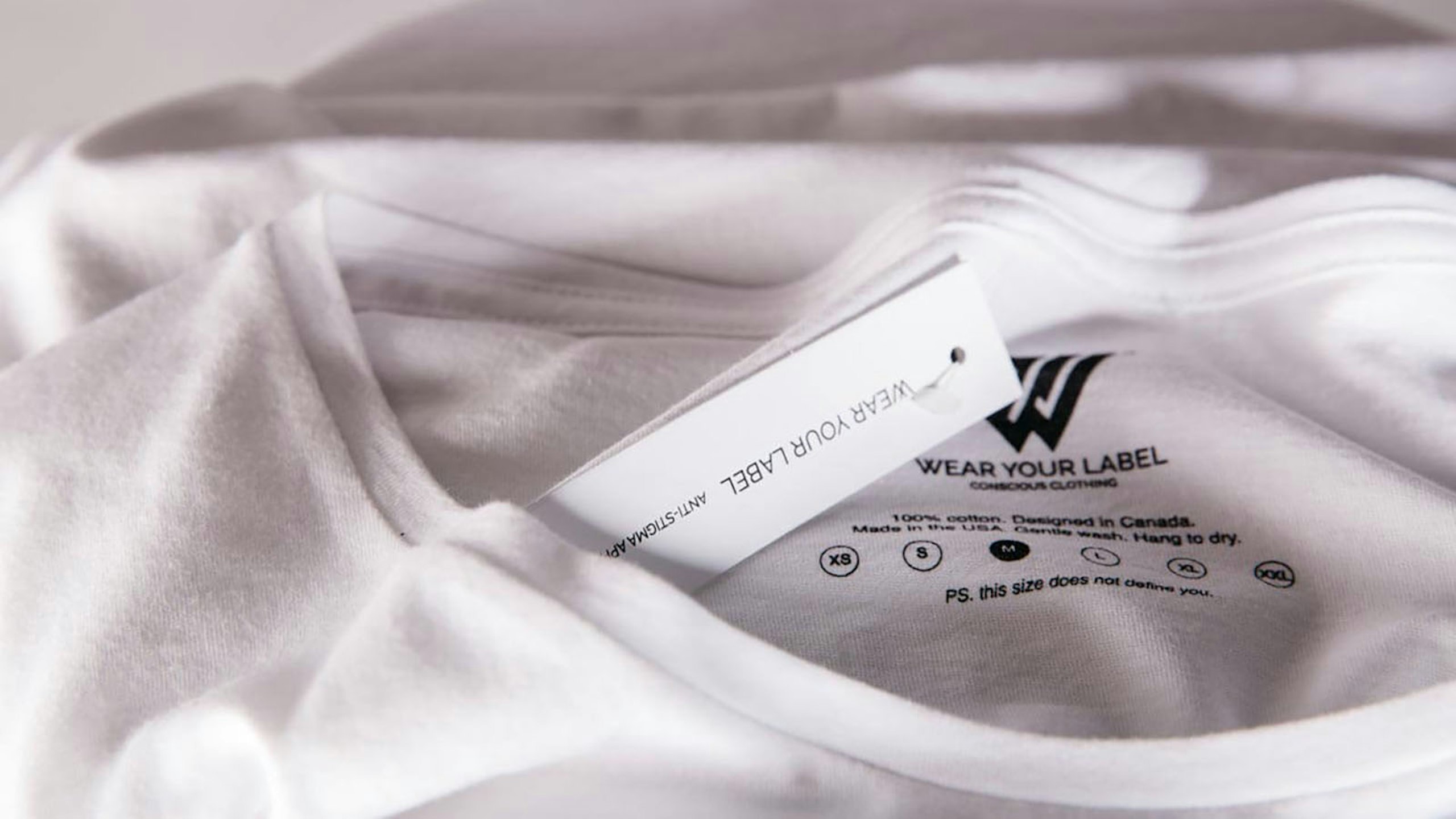 hang tag on a white shirt
