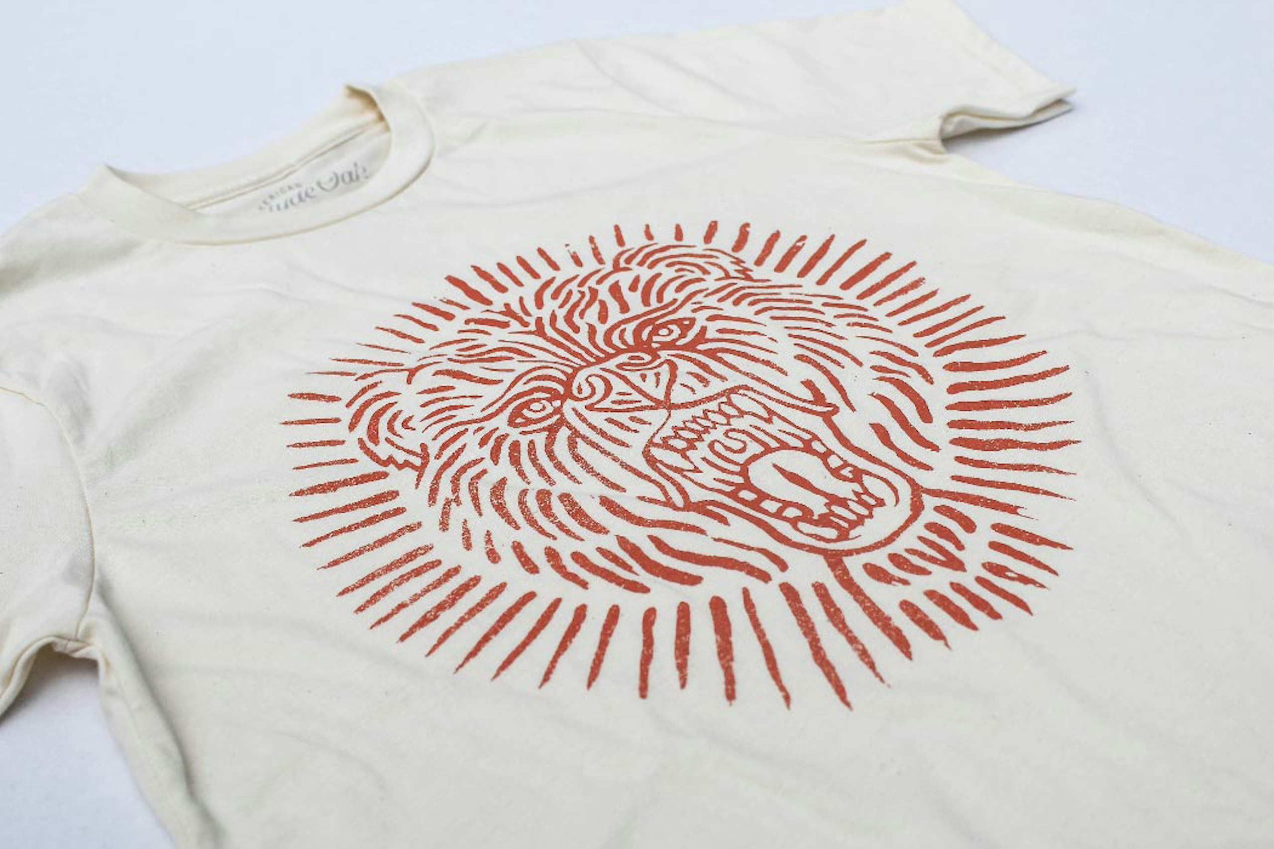 white sure with a bear printed on it