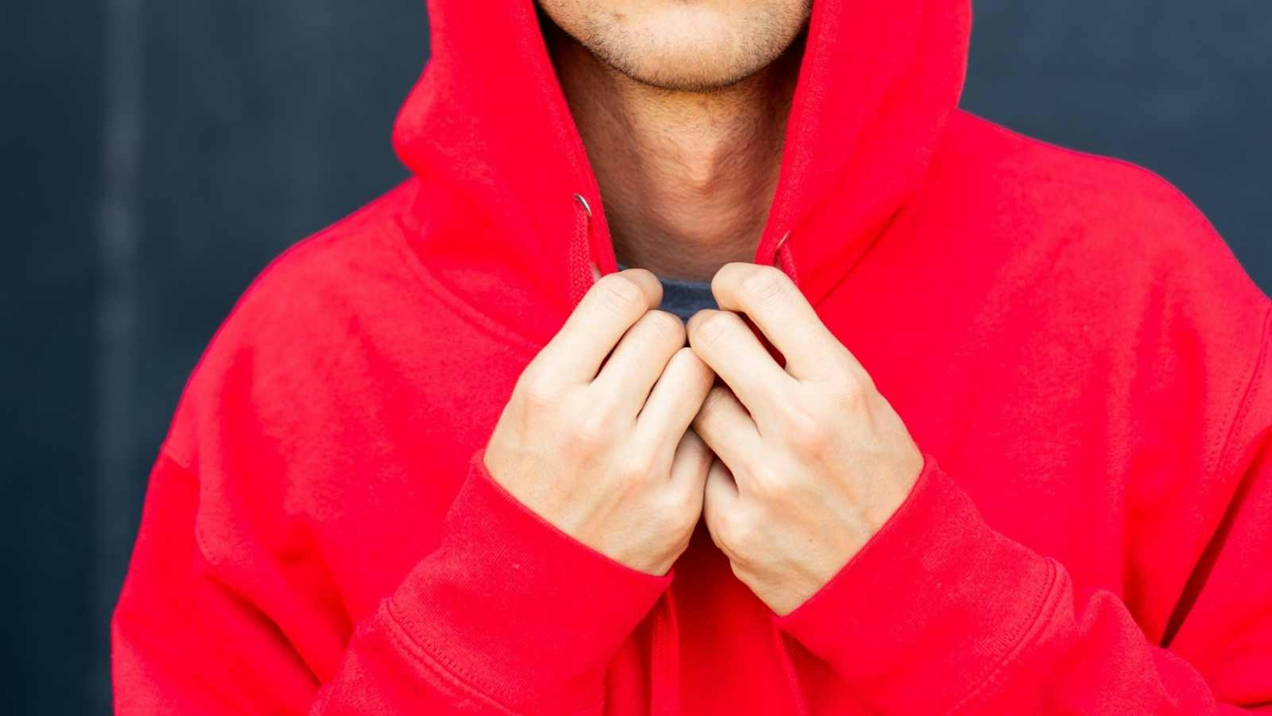 someone wearing a red hoodie