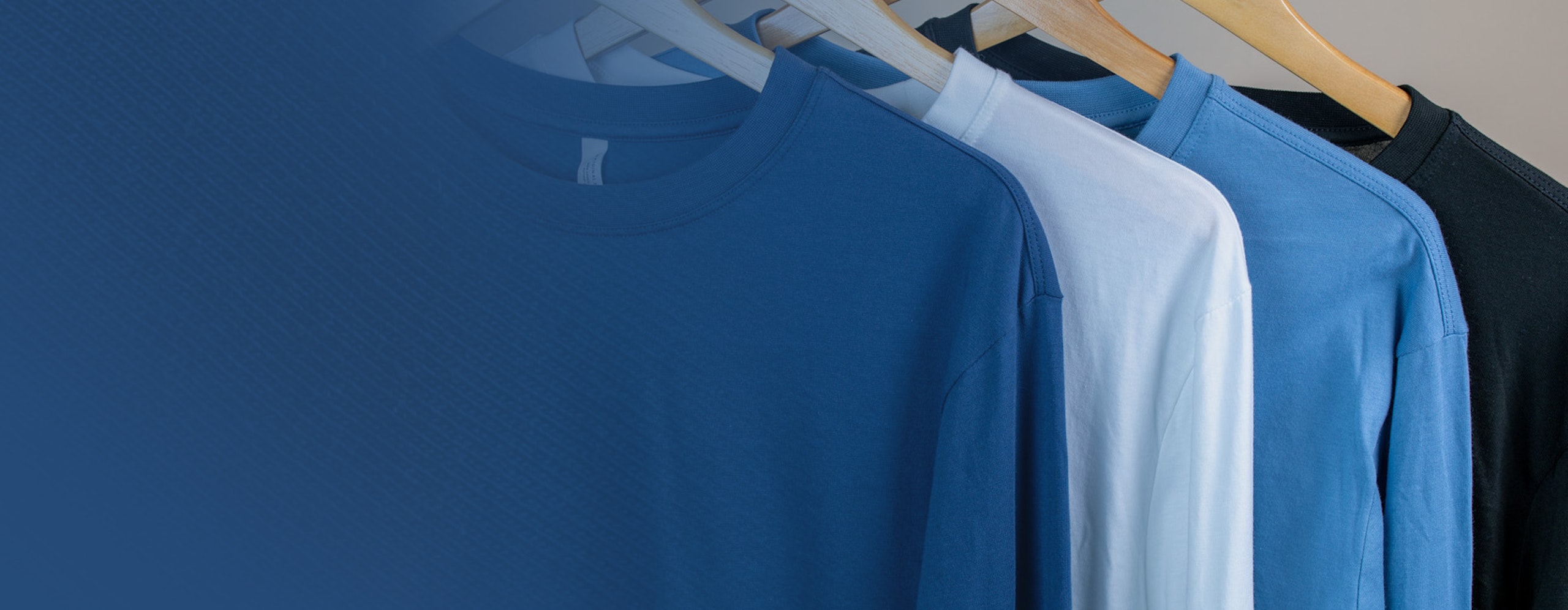 four long sleeve t-shirts hanging