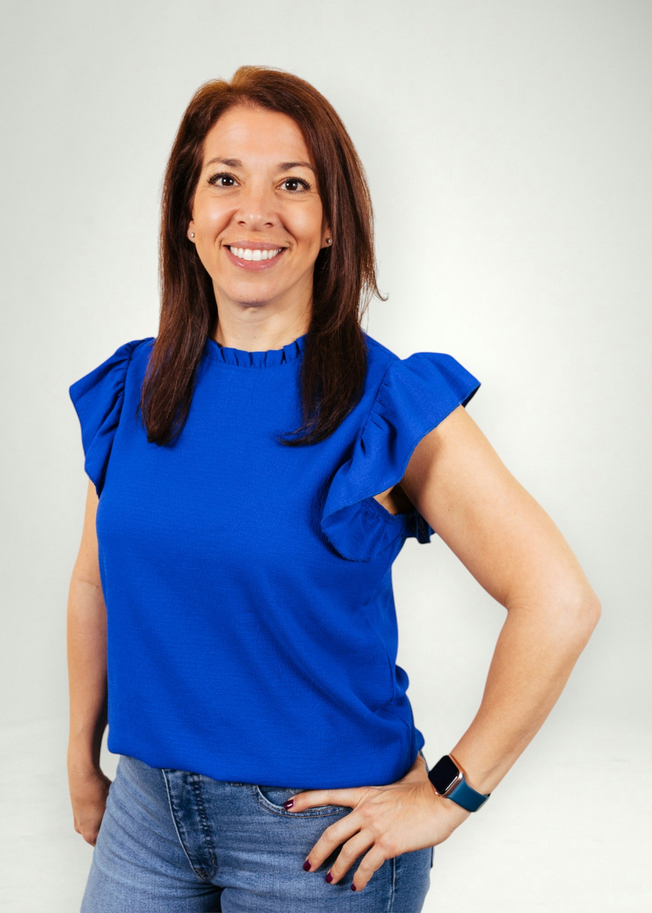 Filomena poses in front of white background