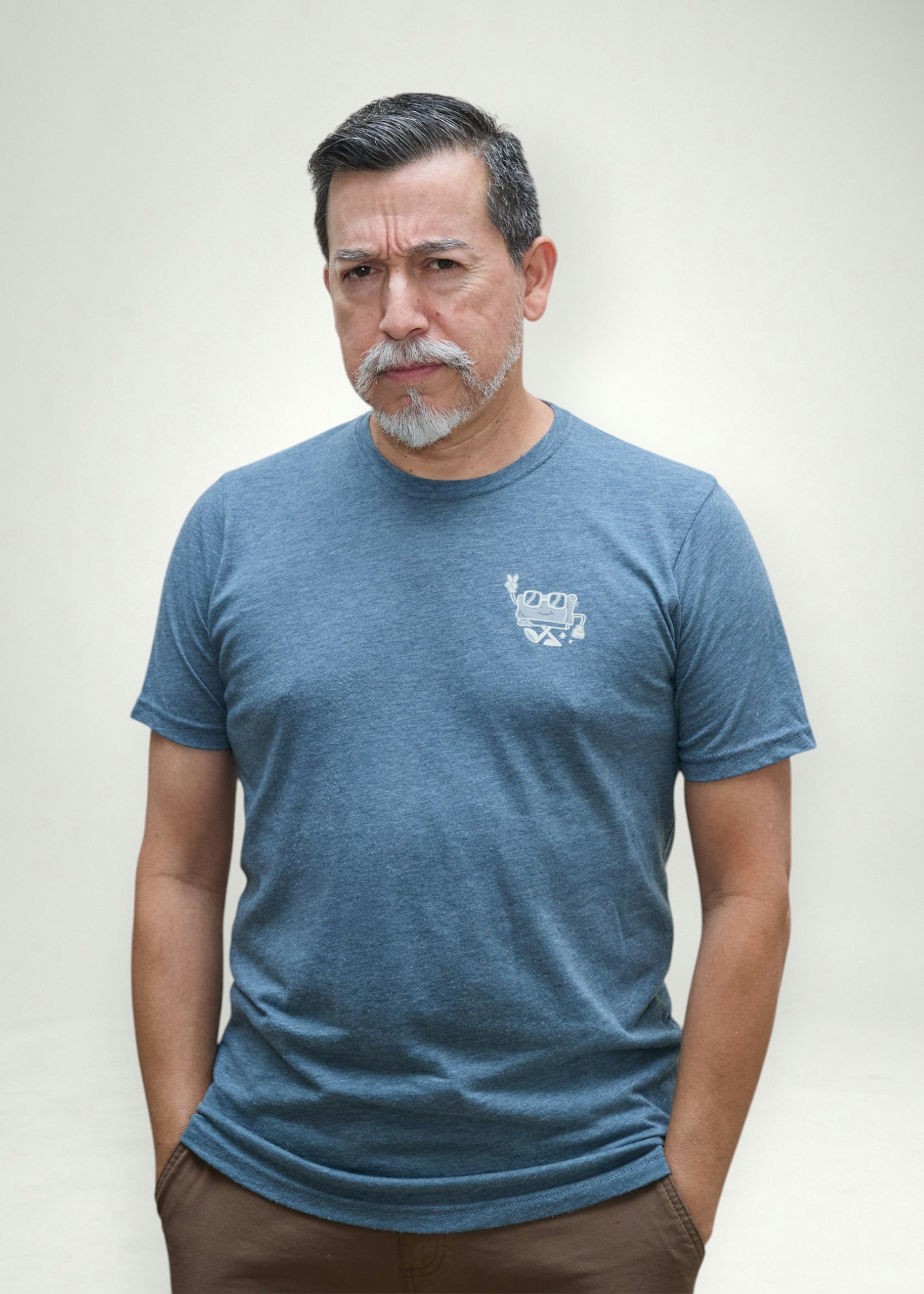Hector poses in front of white background