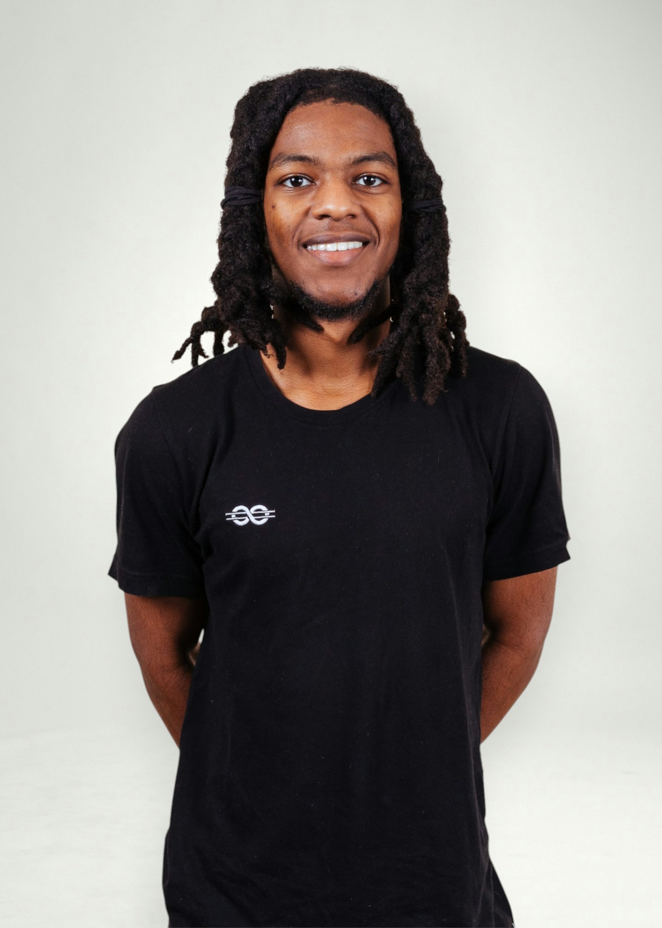 Jordan poses in front of white background