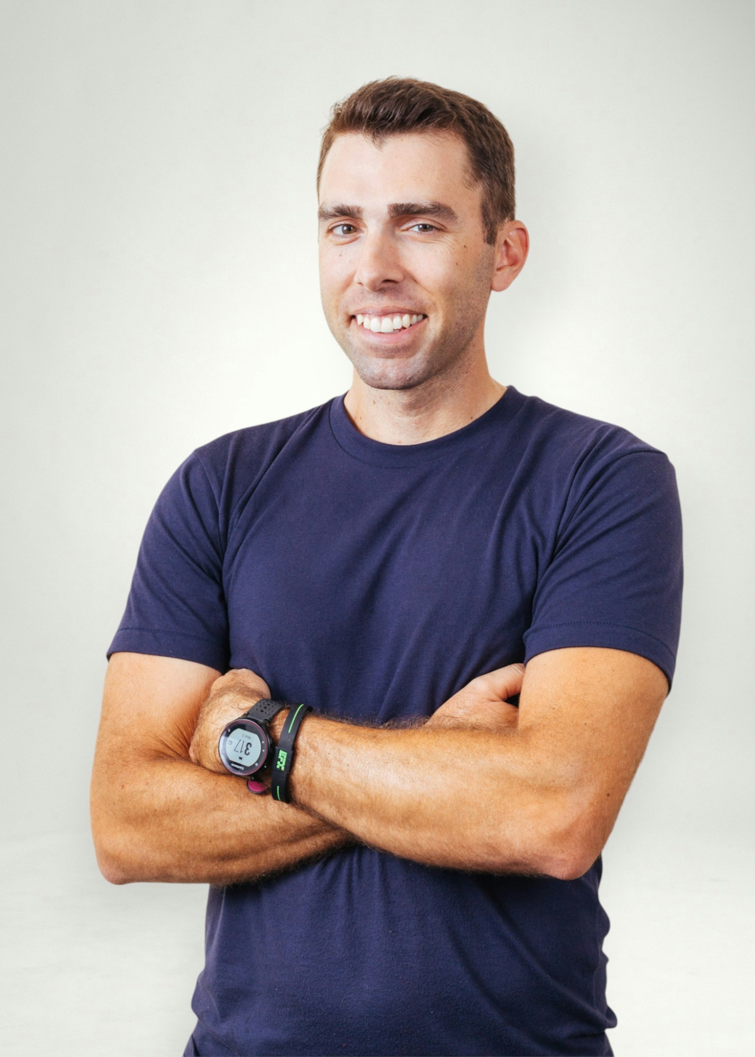 Matt poses in front of white background