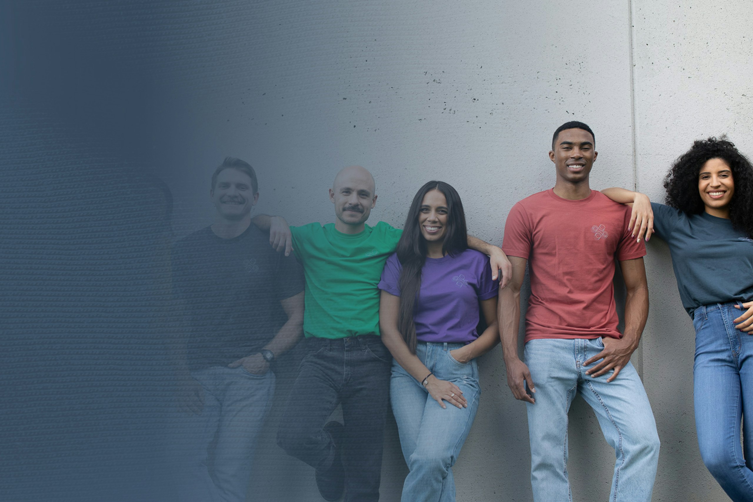 group of people wearing multiple color t-shirts