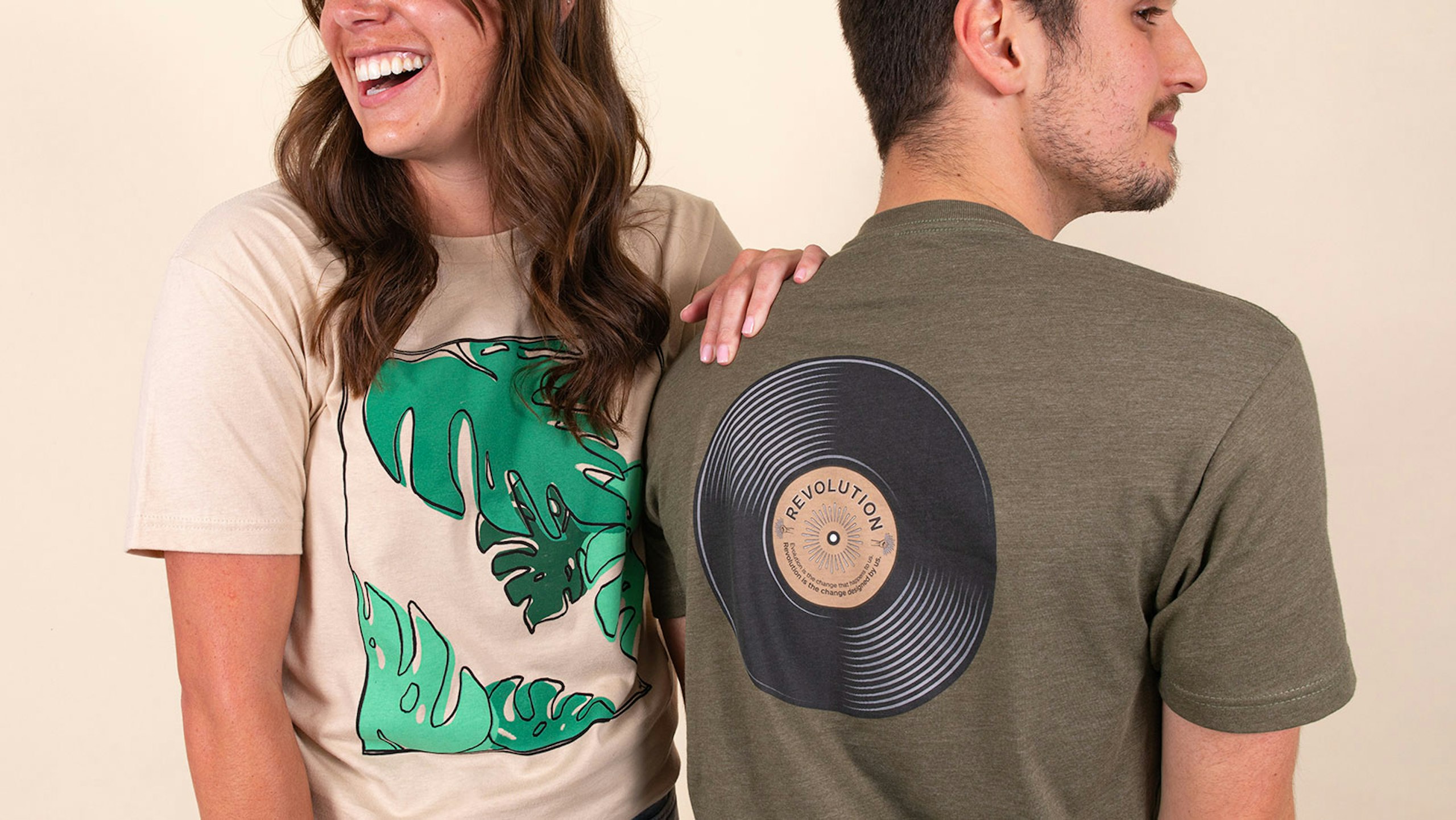women wearing a tan t-shirt and a man wearing a olive tee