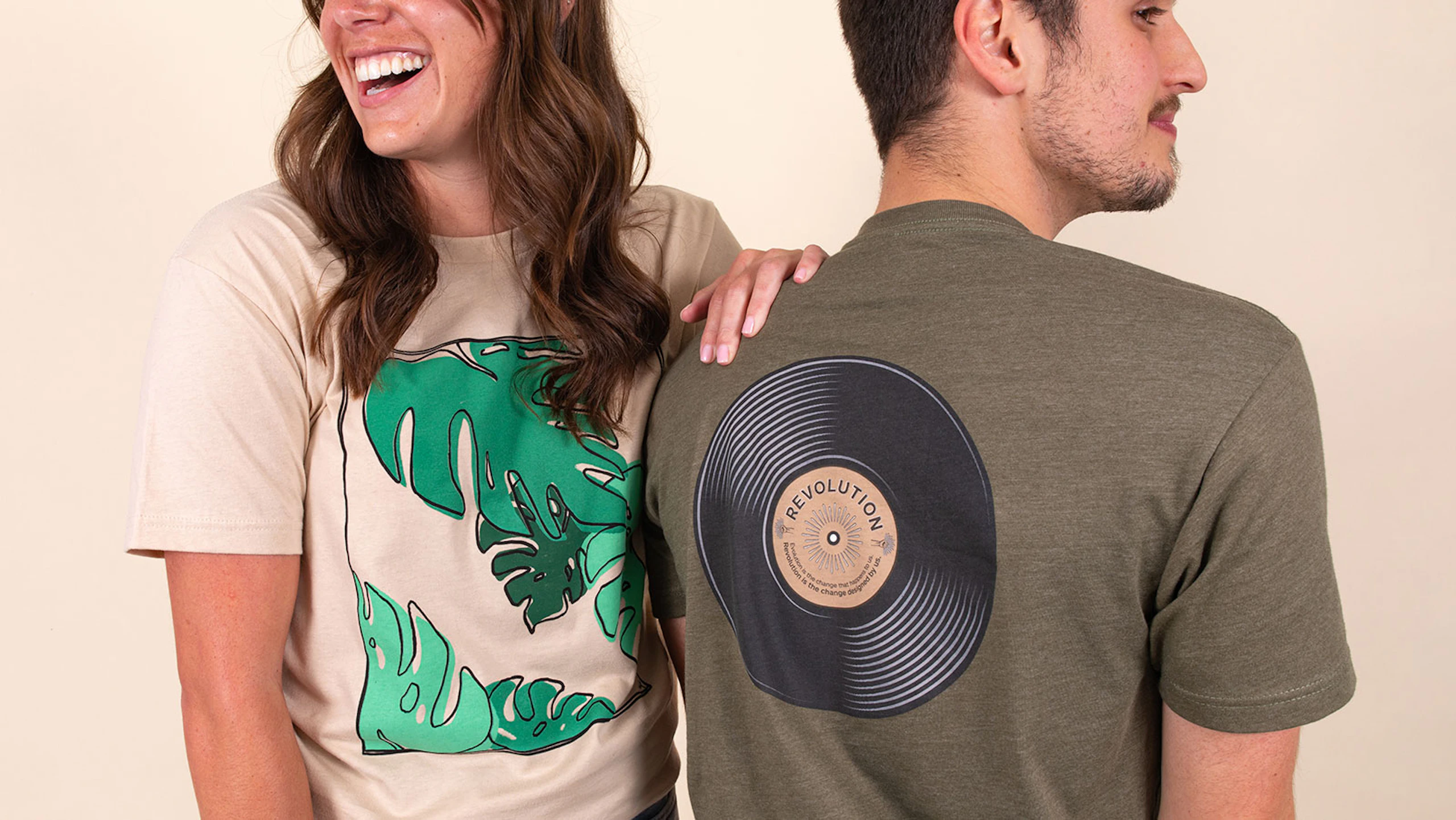 women wearing a tan t-shirt and a man wearing a olive tee