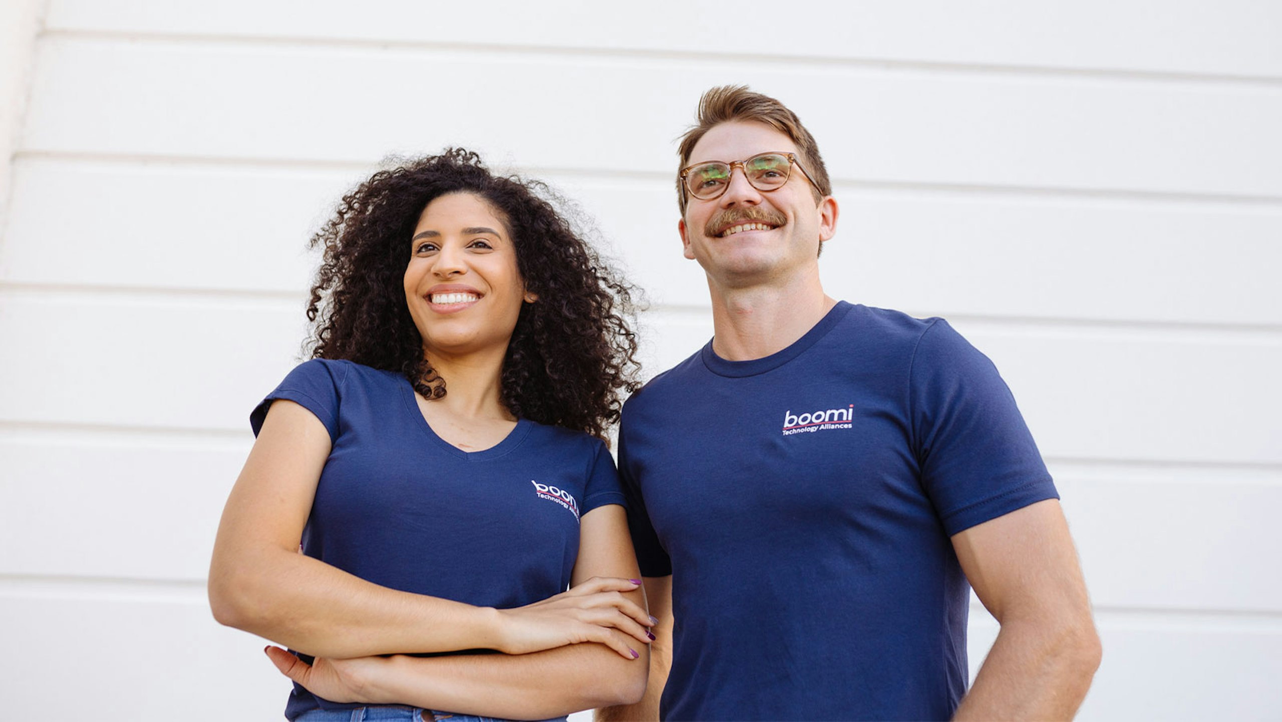 man and women wearing a navy t-shirt