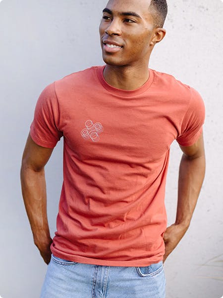 man wearing a red tee man wearing a red tee