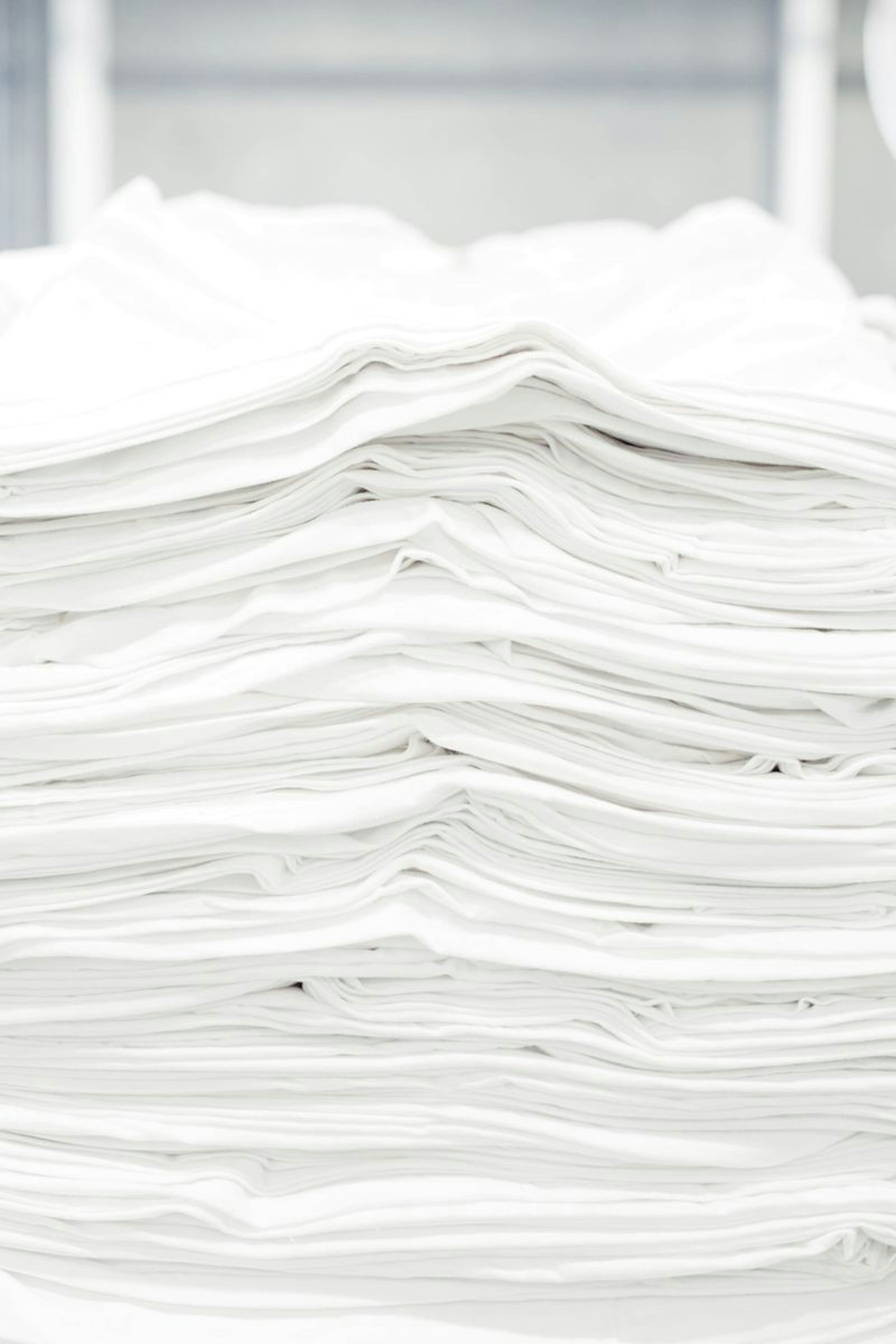 stack of white t-shirts