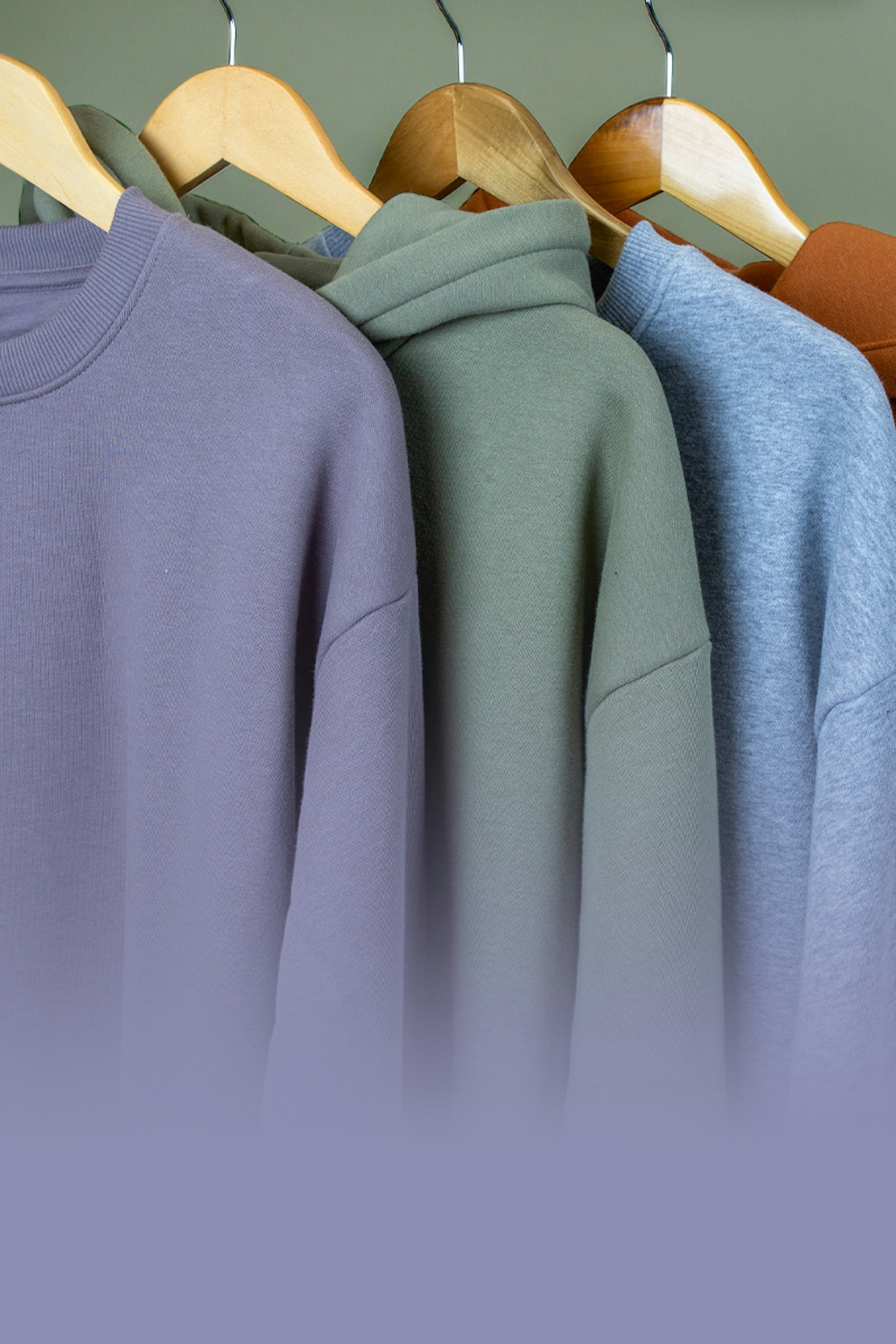 sweatshirts and hoodies hanging with the words sweatshirt & hoodies